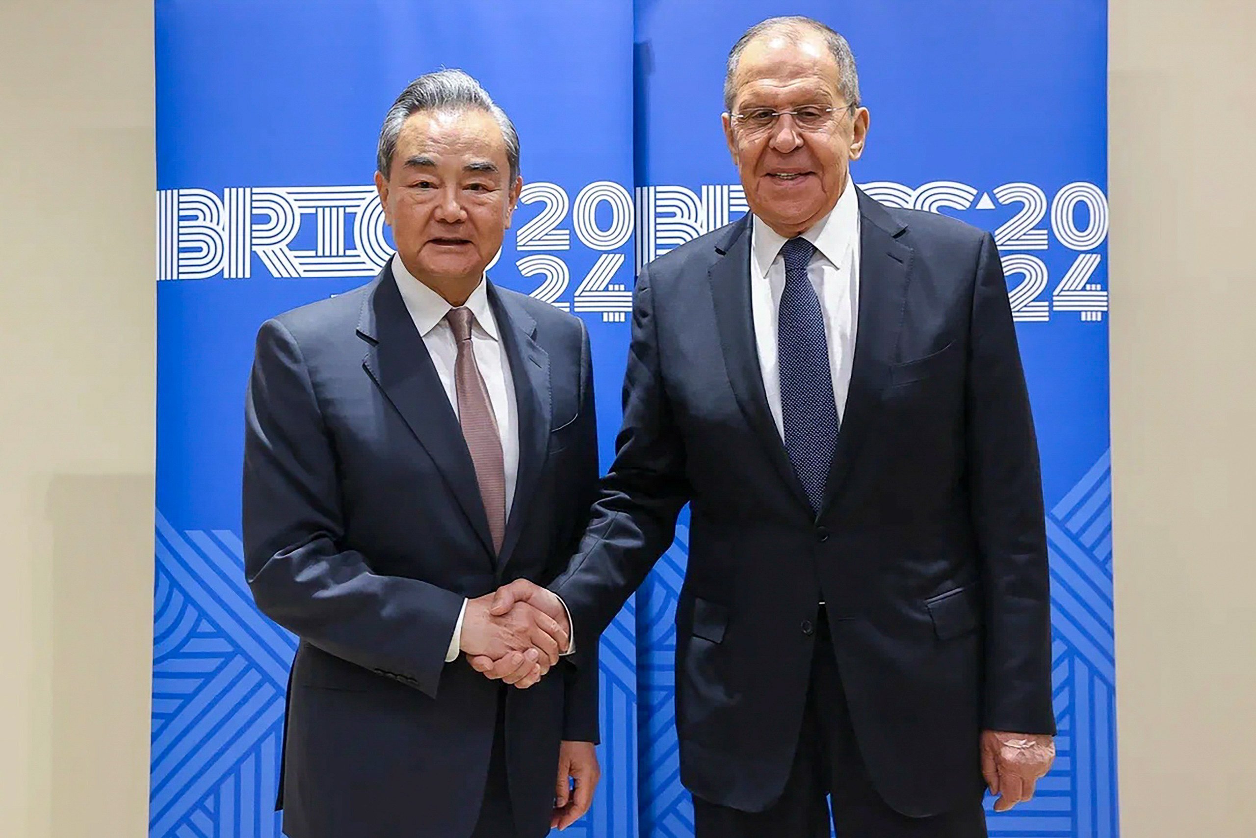 Chinese Foreign Minister Wang Yi (left) with his  Russian counterpart Sergey Lavrov on the sidelines of the Brics foreign ministers’ summit in Nizhny Novgorod on Monday. Photo: EPA-EFE