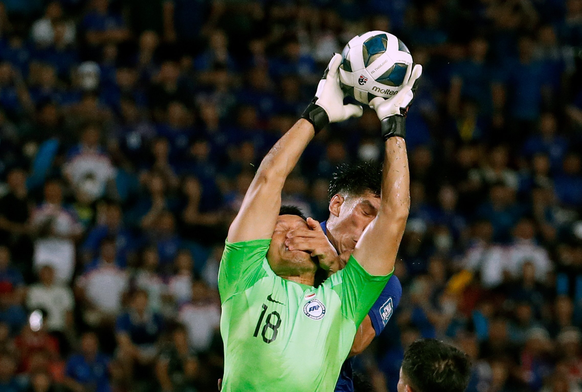 Singapore goalkeeper Hassan Sunny has been praised for his heroic performance against Thailand by Chinese football fans. Photo: EPA
