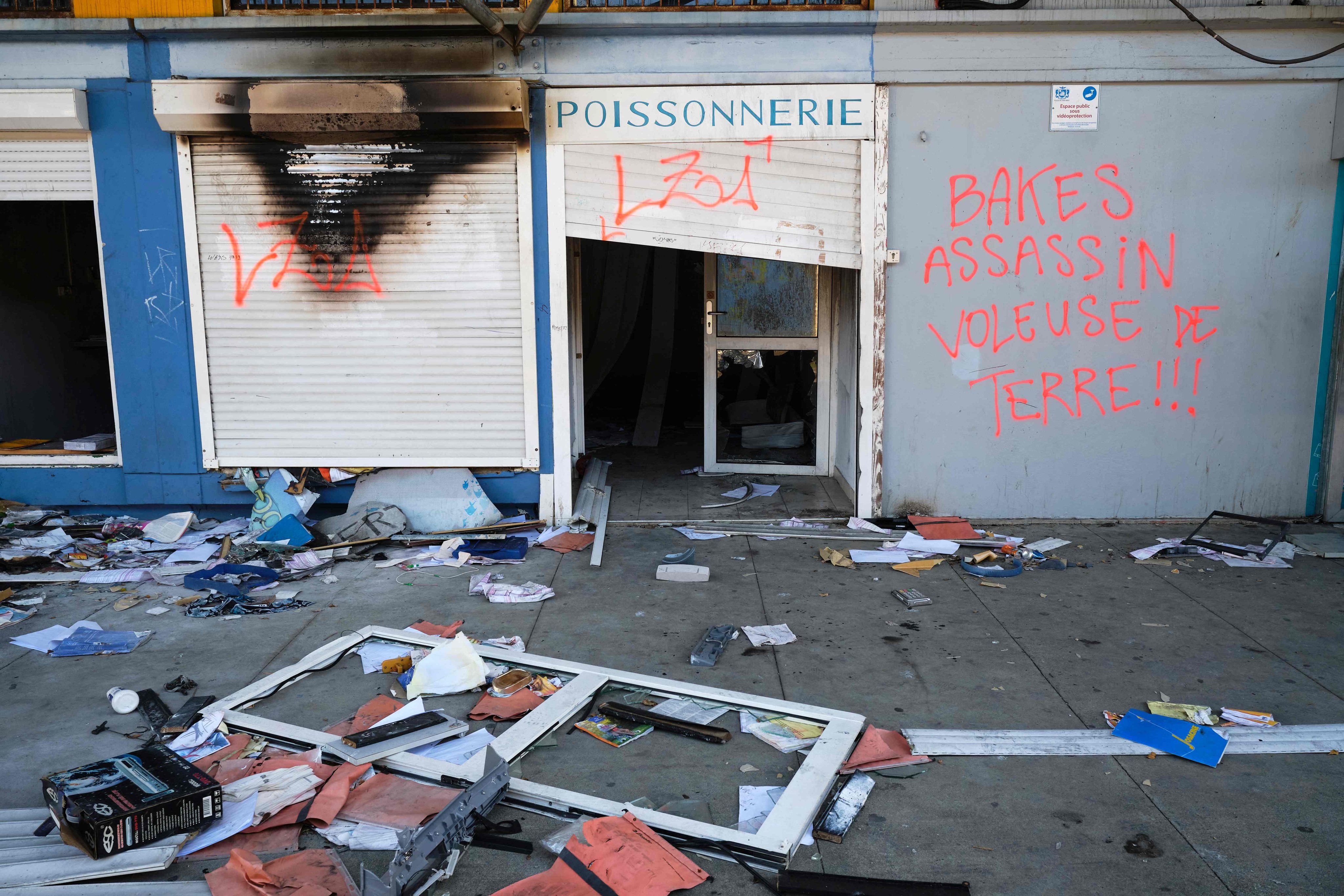 A destroyed shop is seen in Noumea. France suspended a planned electoral reform in its overseas territory of New Caledonia, which triggered civil unrest. Photo: AFP