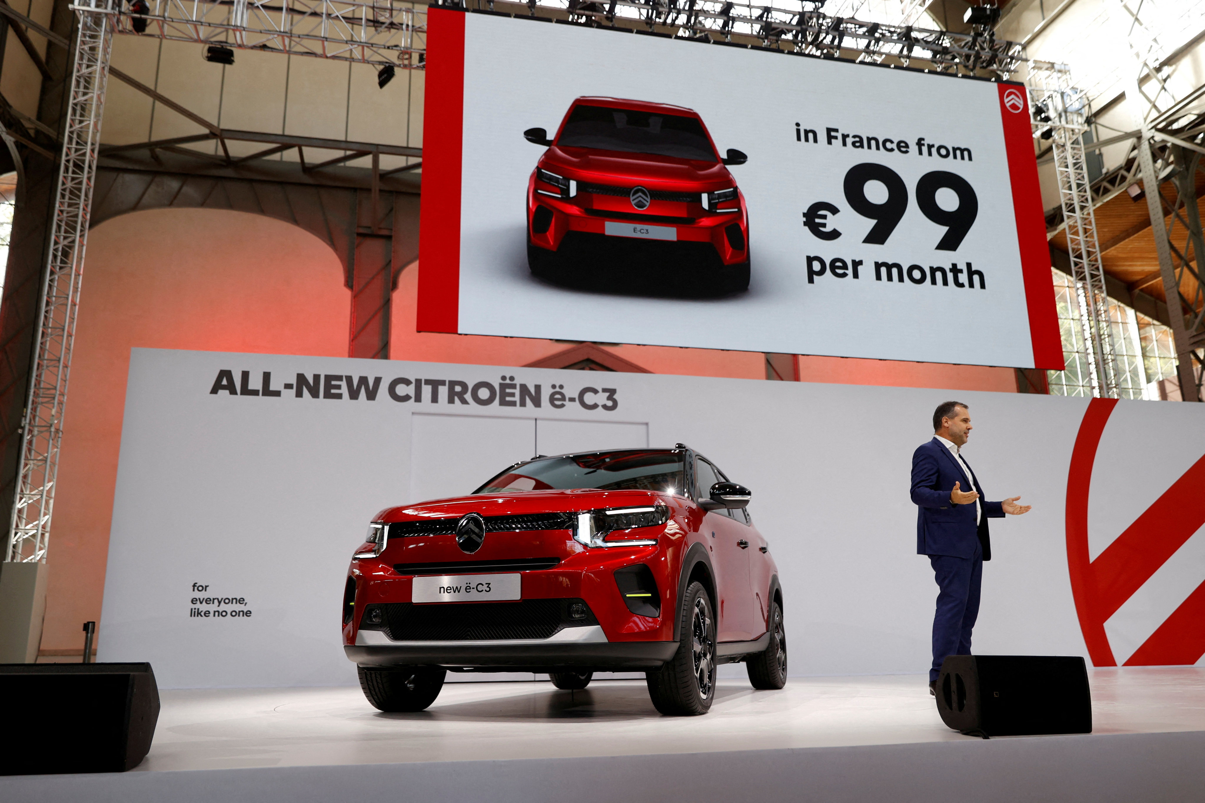 Nicolas Monnot, Head of pricing for Citroen brand, delivers a speech during the unveiling of the new electric Citroen e-C3 SUV during a presentation to the media in Meudon near Paris on October 17, 2023. Photo: Reuters