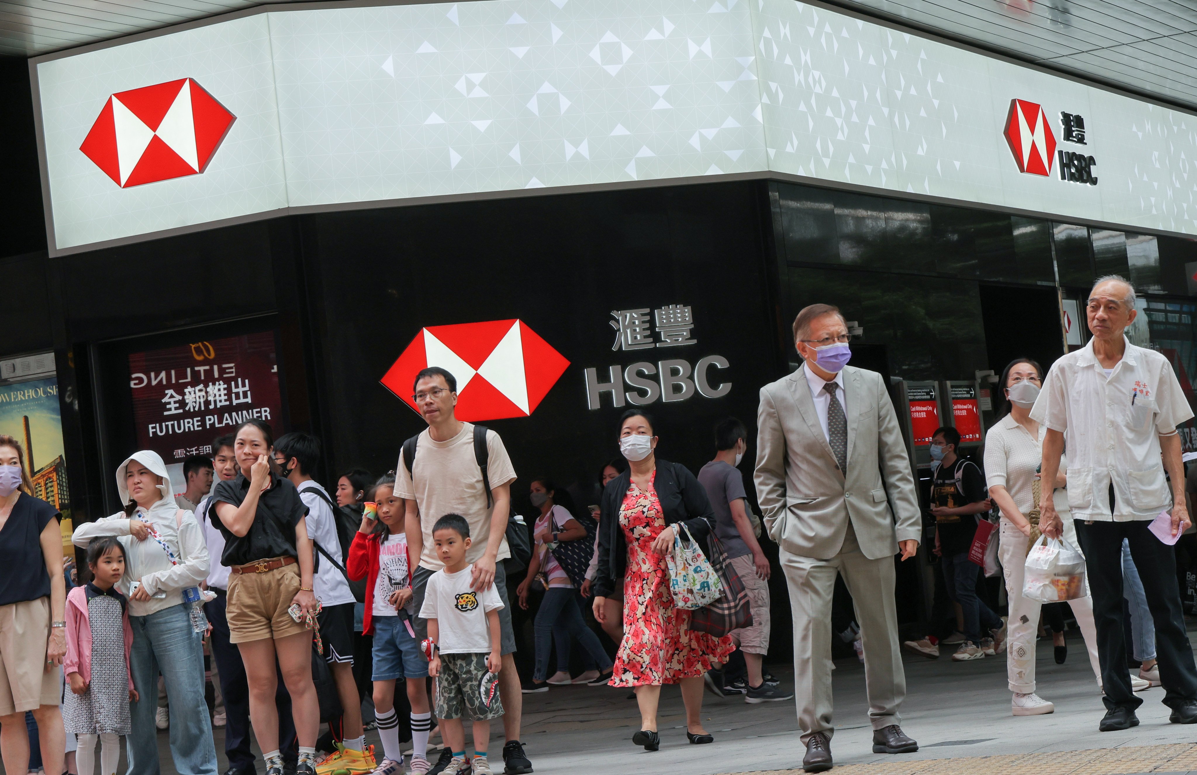 Pedestrians walk past an HSBC branch in Central, Hong Kong, on May 2, 2023. Photo: Jelly Tse