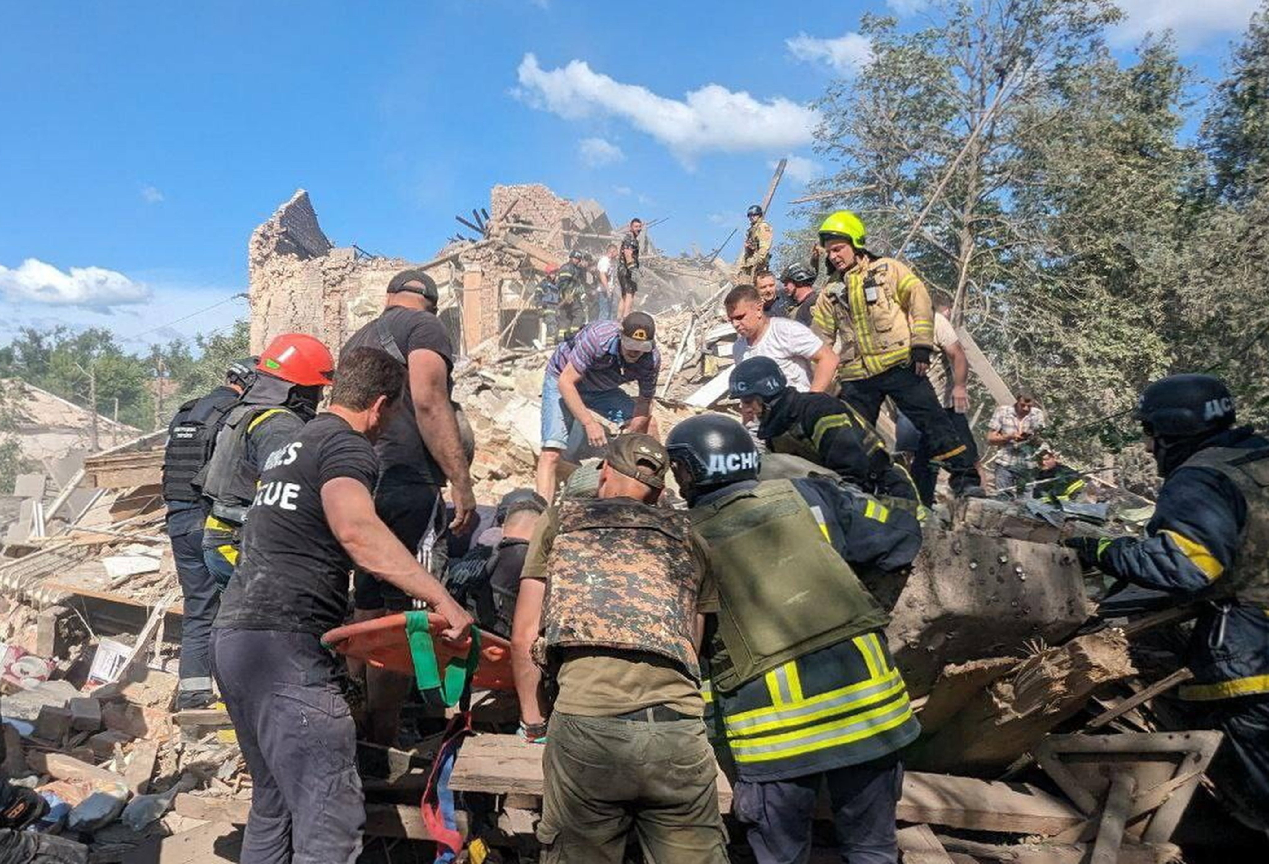 Rescuers working at the site of a missile strike in central Ukraine on Wednesday. Photo: EPA
