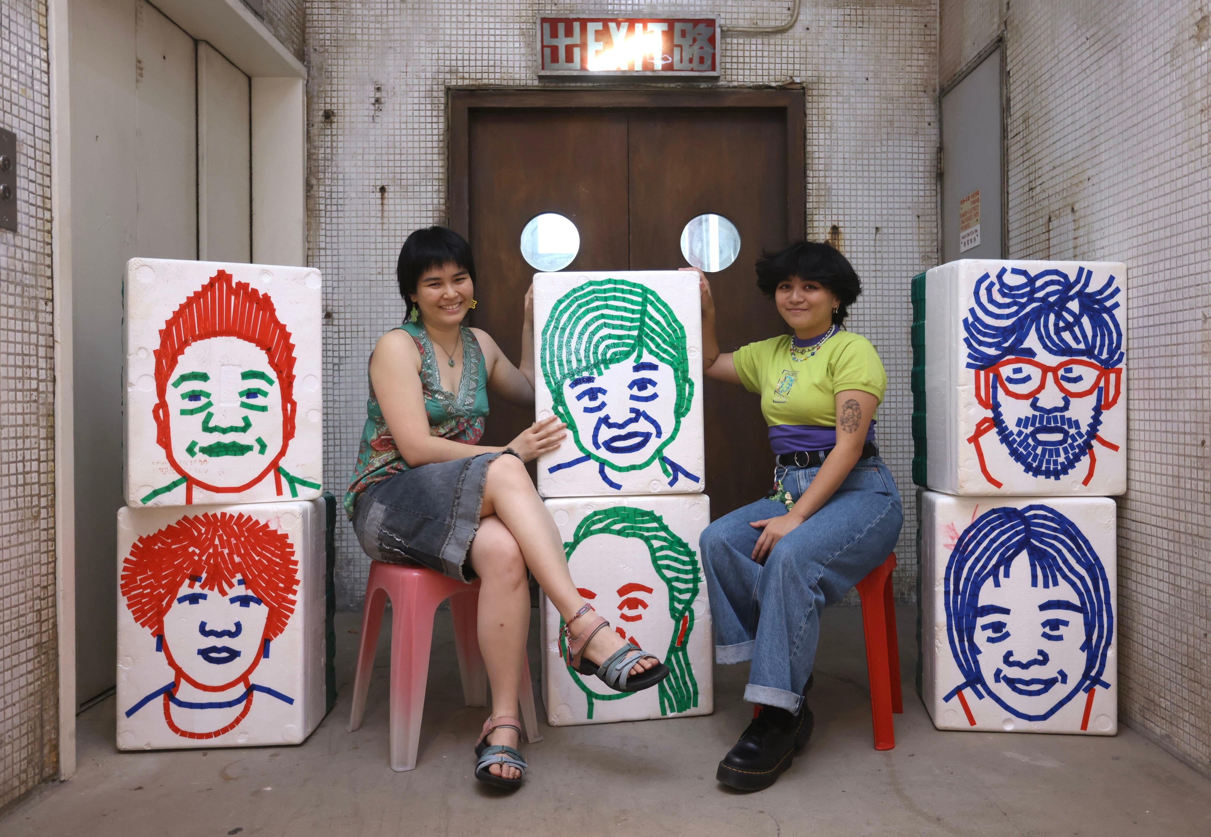 Curator Nicole Nepomuceno and producer Faith Monsod pose with pieces at the Marginalia (Notes from the Peripheries) exhibition at Current Plans gallery in Wong Chuk Hang. Photo: Jonathan Wong