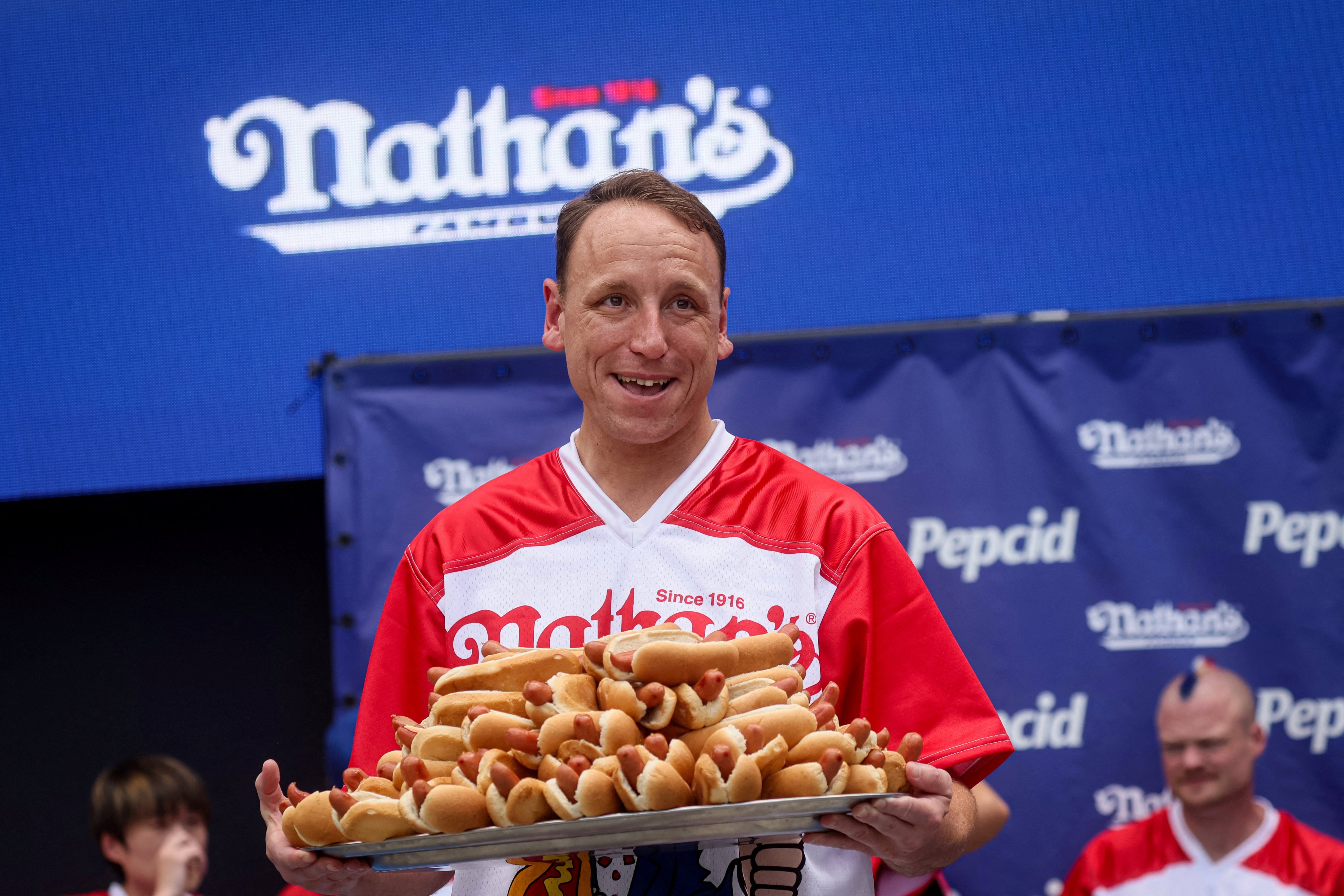 US competitive eating legend Joey Chestnut will face off against a fierce rival in a hot-dog eating contest on Netflix after he was excluded from Nathan’s Famous Fourth of July hot-dog eating contest. Photo: Reuters
