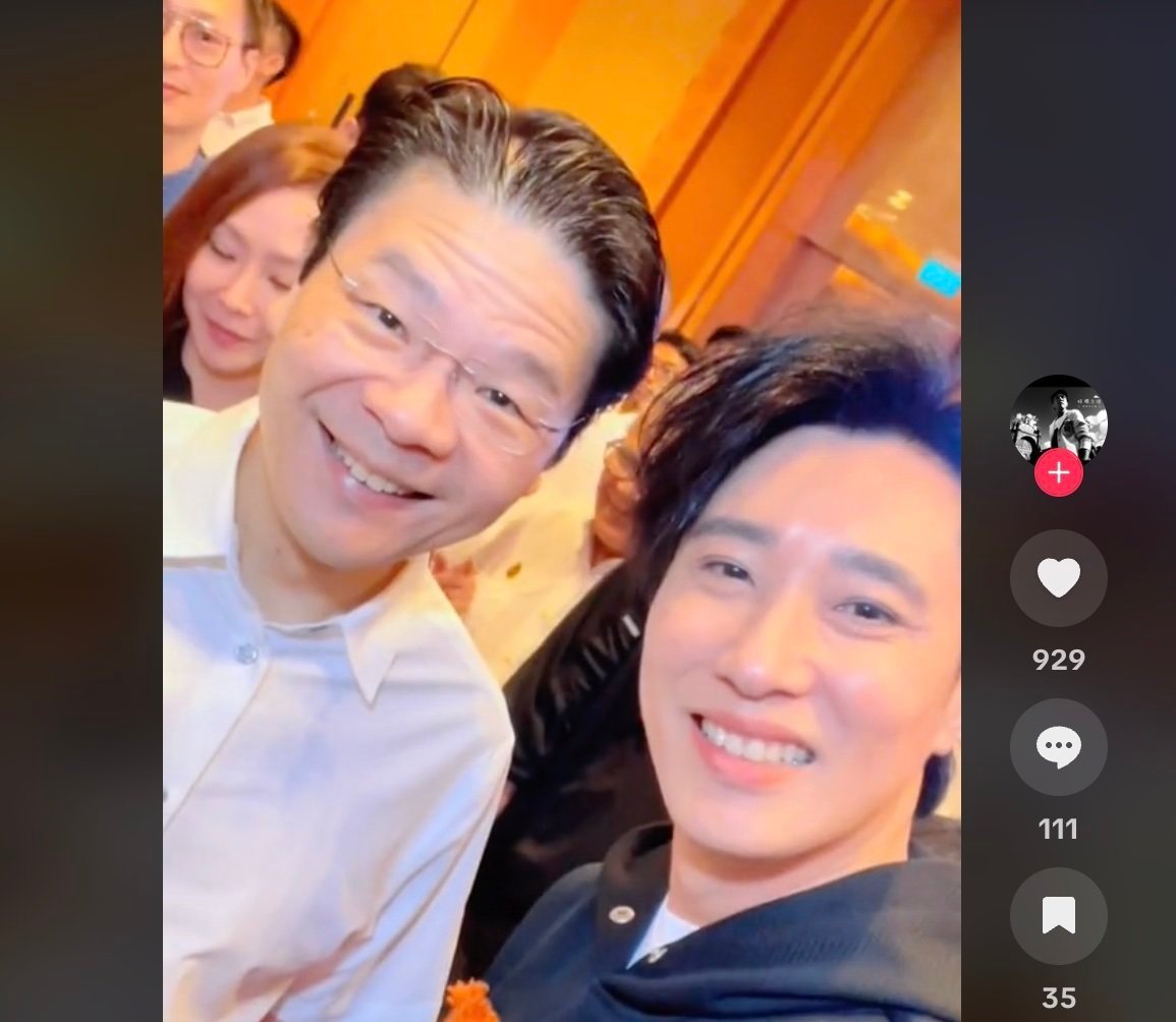 Singapore’s Prime Minister Lawrence Wong and NoonTalk’s co-founder Dasmond Koh posing for a wefie at a People’s Action Party event in Singapore on June 8. Photo: @dasmondkoh/TikTok