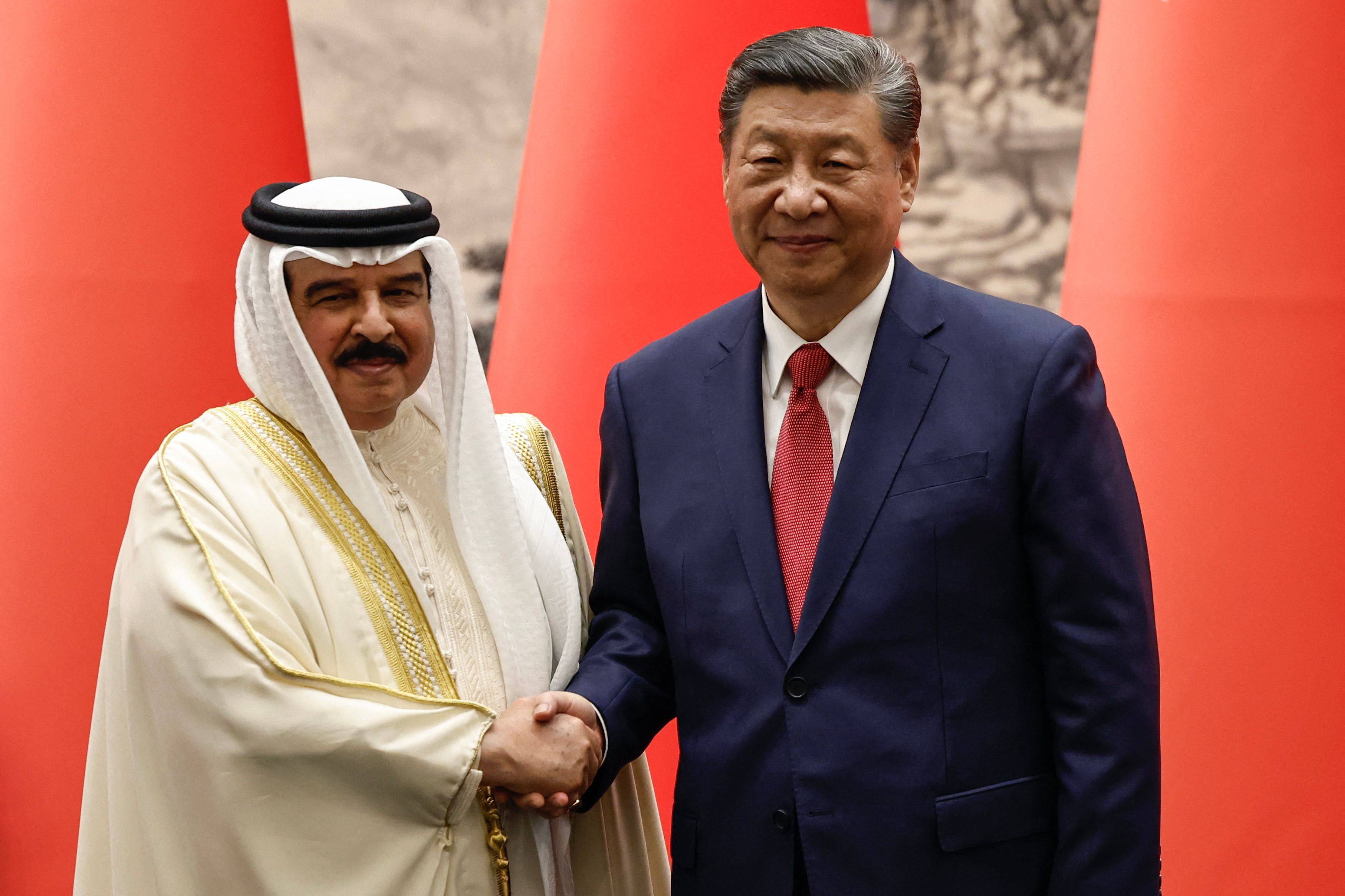 Chinese President Xi Jinping shakes hands with Bahrain’s King Hamad bin Isa al-Khalifa shake hands following a signing ceremony in Beijing on May 31. Photo: AFP