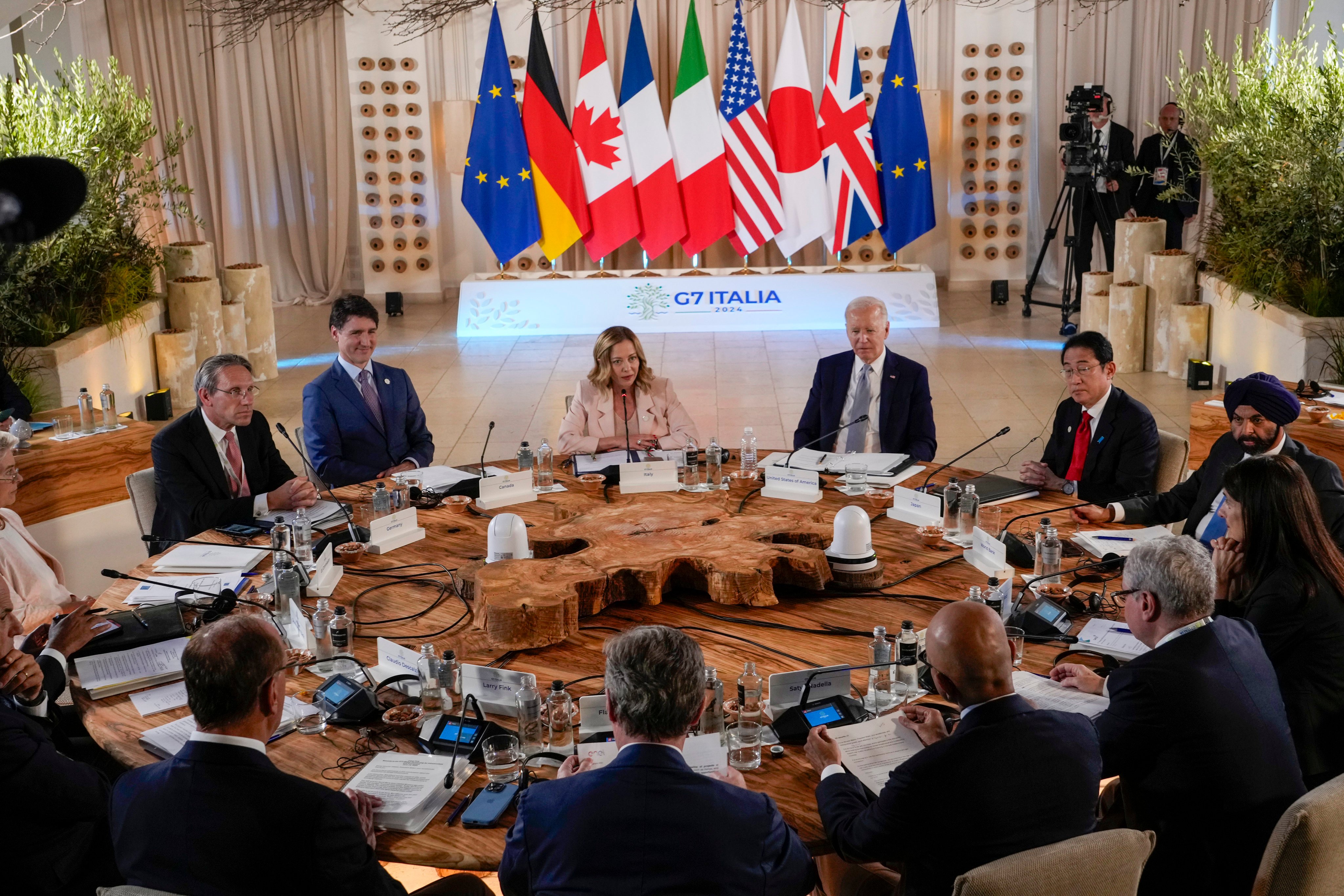 Group of 7 leaders at a global infrastructure and investment event during their summit, in southern Italy on Thursday. Photo: AP