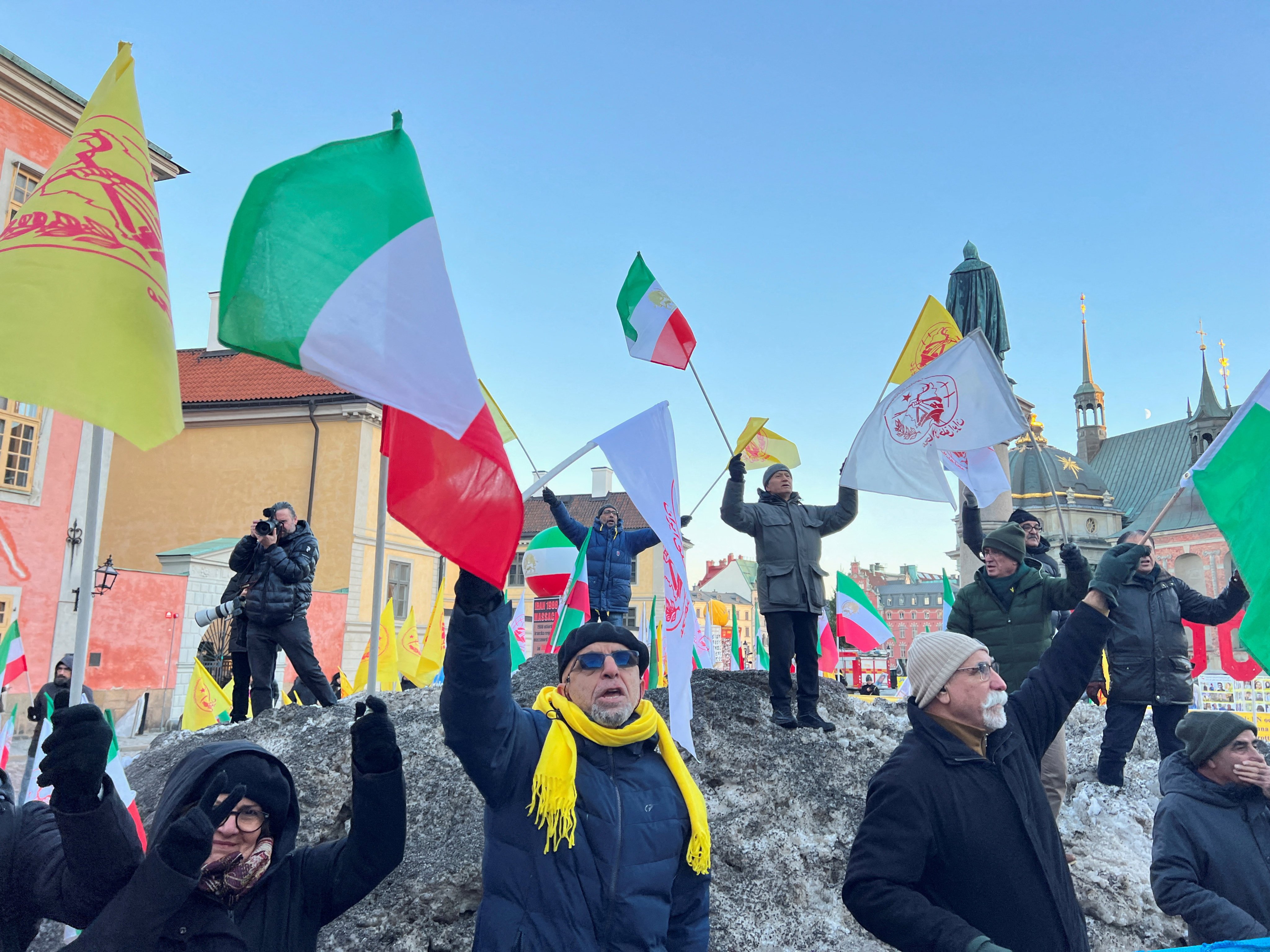 People in Stockholm, Sweden, celebrate the guilty verdict of Iranian Hamid Noury in December. Convicted of being involved in a mass execution of Iranian political prisoners, he is due back in Iran soon, following a prisoner swap. Photo: Reuters