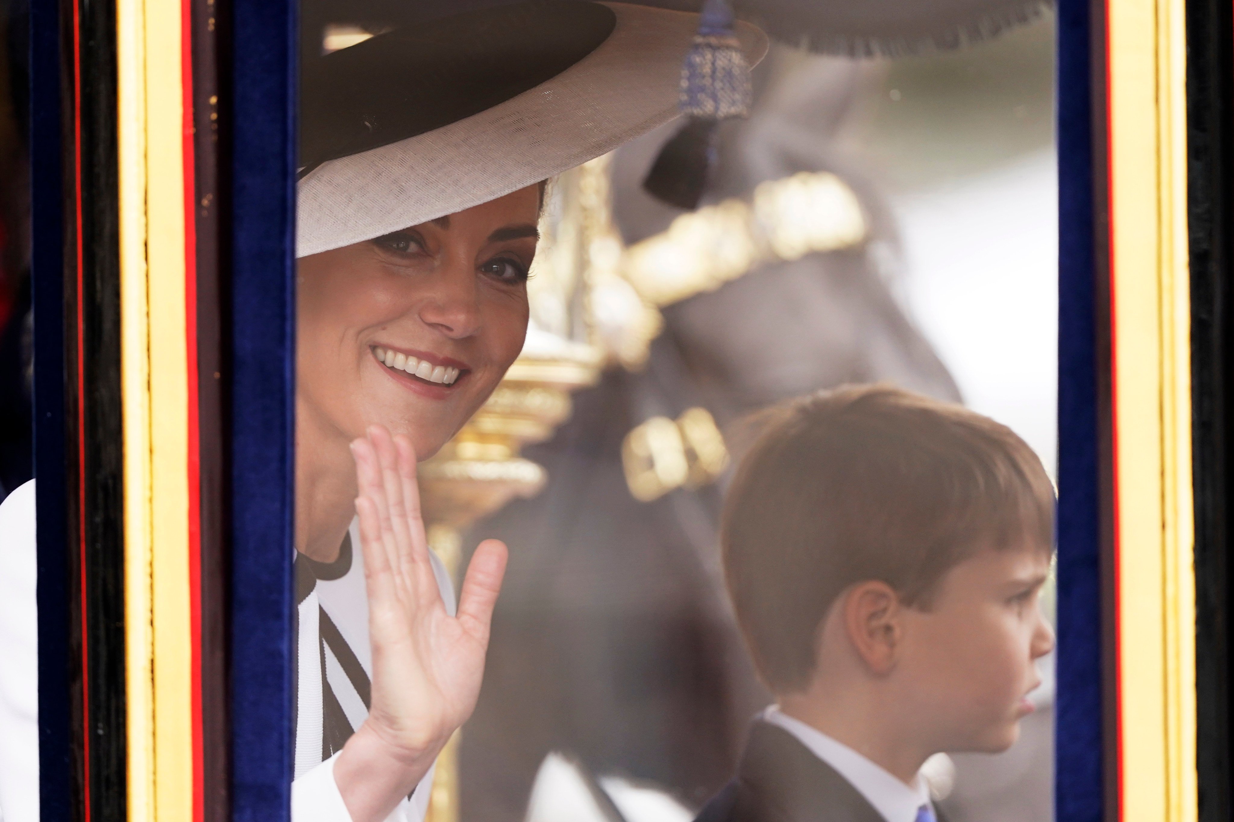 Kate, Princess of Wales, waves to crowds in London on Saturday. Photo: AP