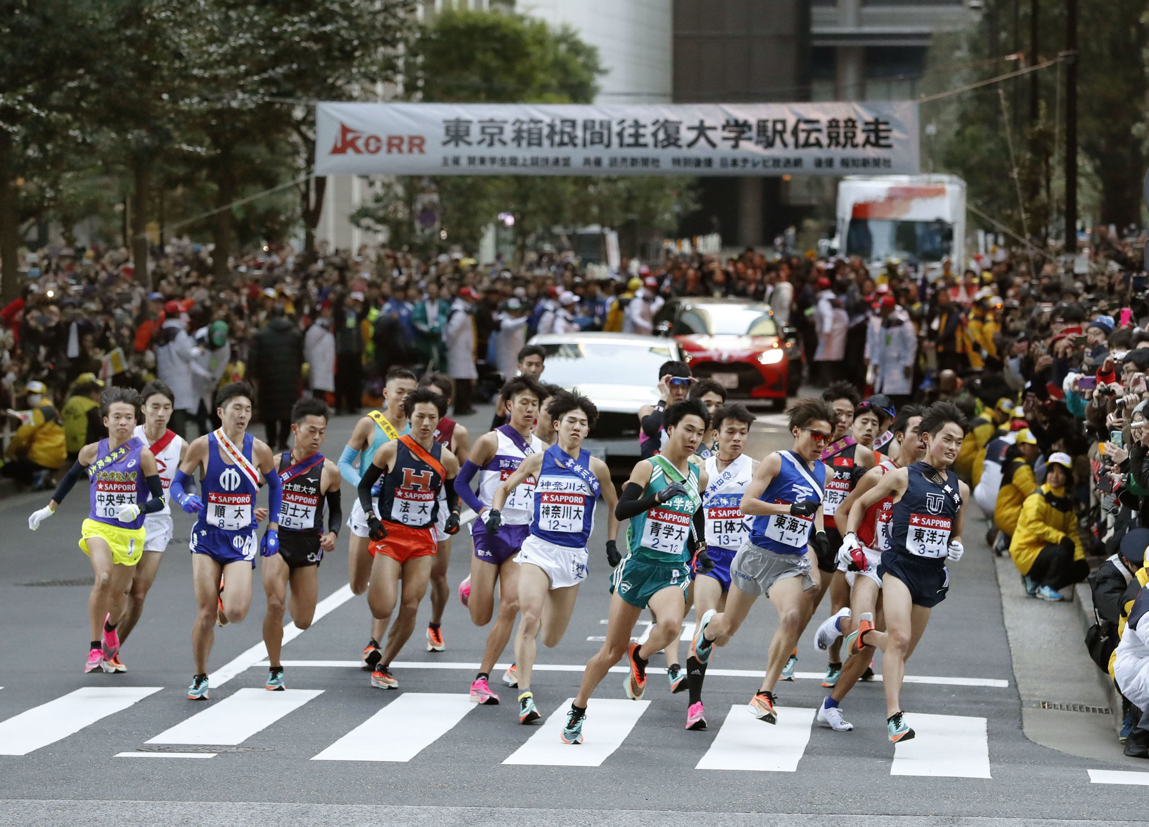 Runners set off on the first day of the Tokyo-Hakone ekiden in 2020. The 219km (136-mile) race celebrated its 100th anniversary this year. Photo: Kyodo