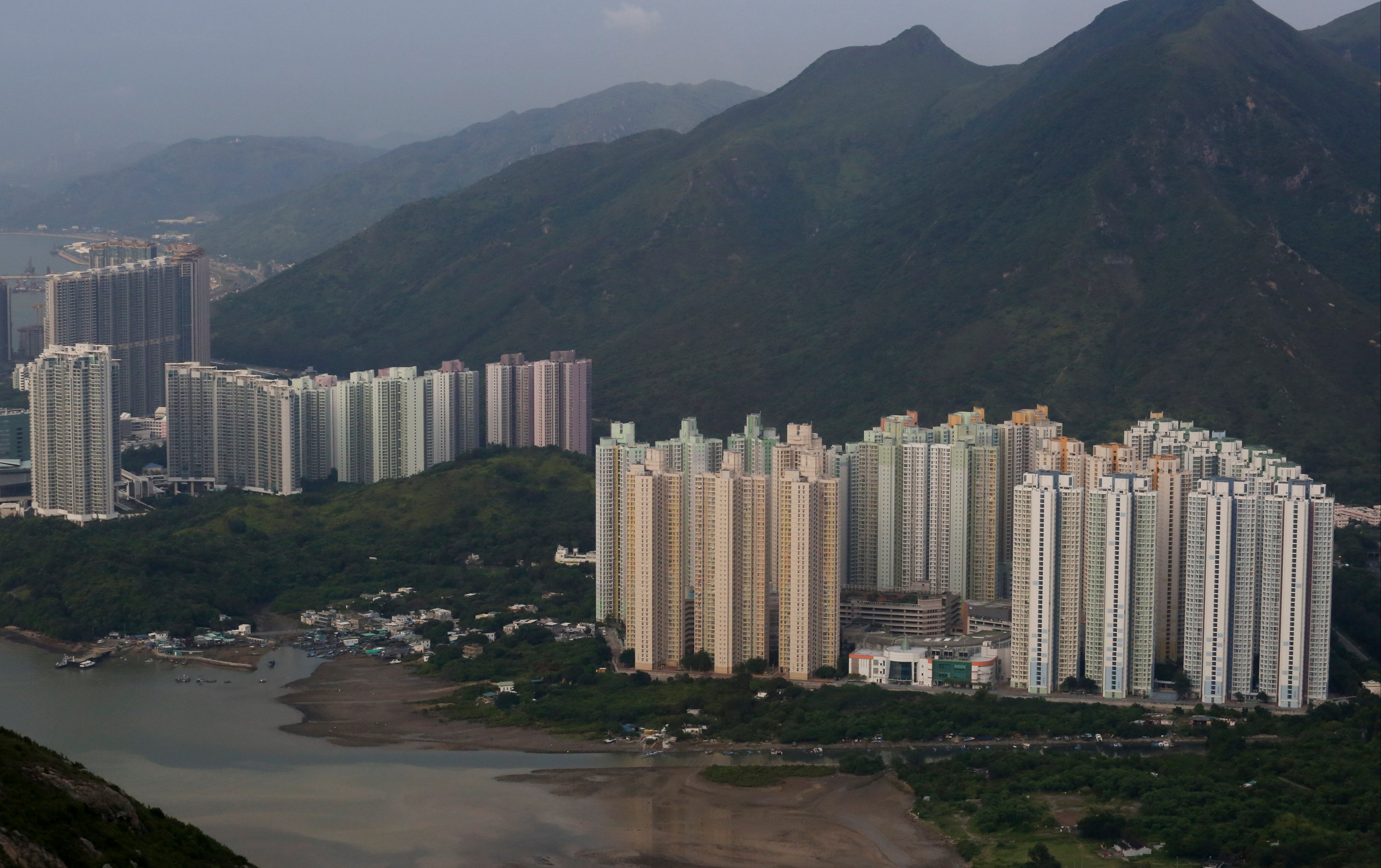 An aerial view of Tung Chung (left), where activist Nathan Law’s mother has been evicted for rent arrears. Photo: SCMP