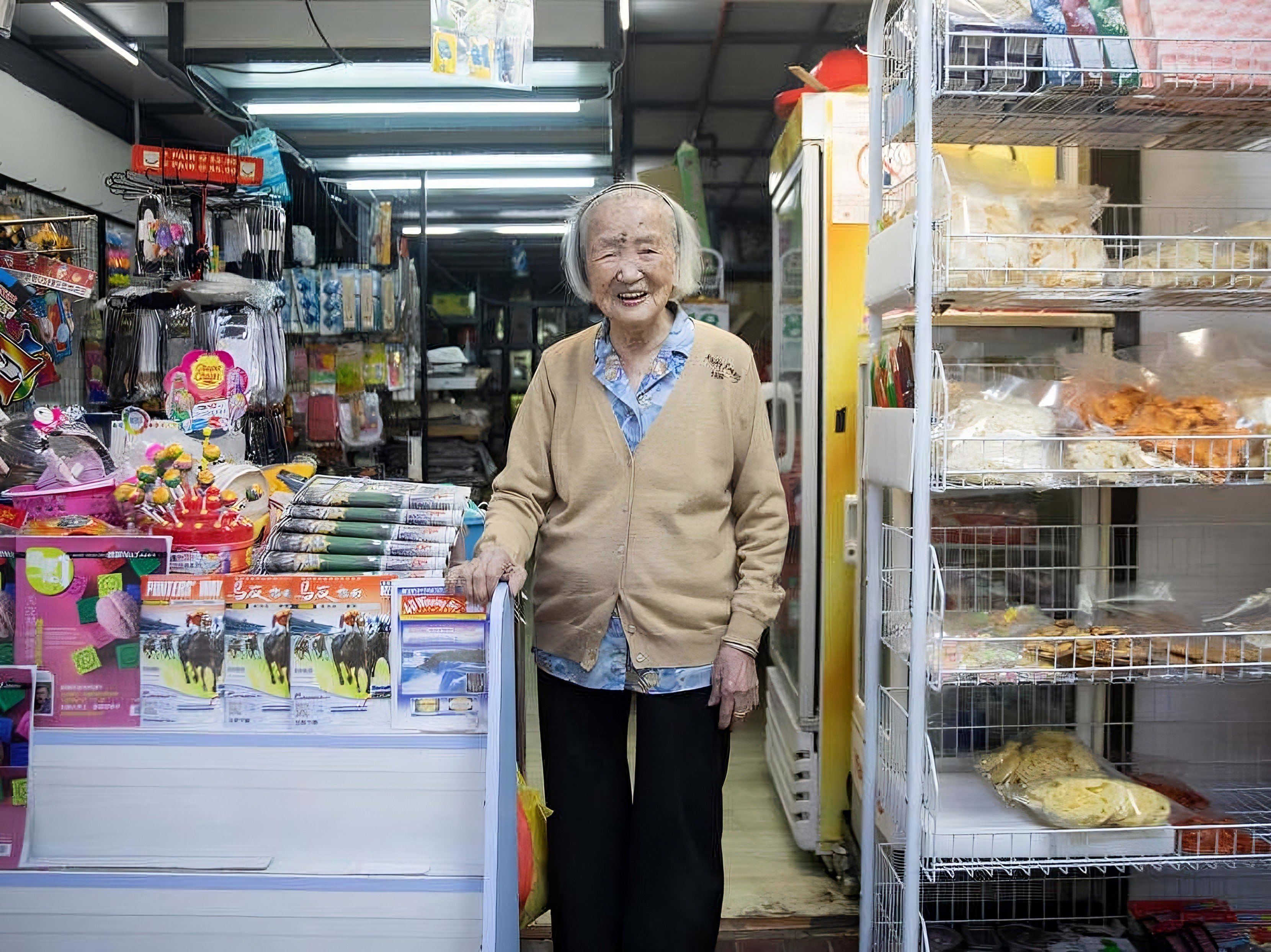 102-year-old Singapore shopkeeper Sie Choo Yong, who emigrated from China, is seen at her shop in Beauty World Centre. Photo: X/TodayOnline