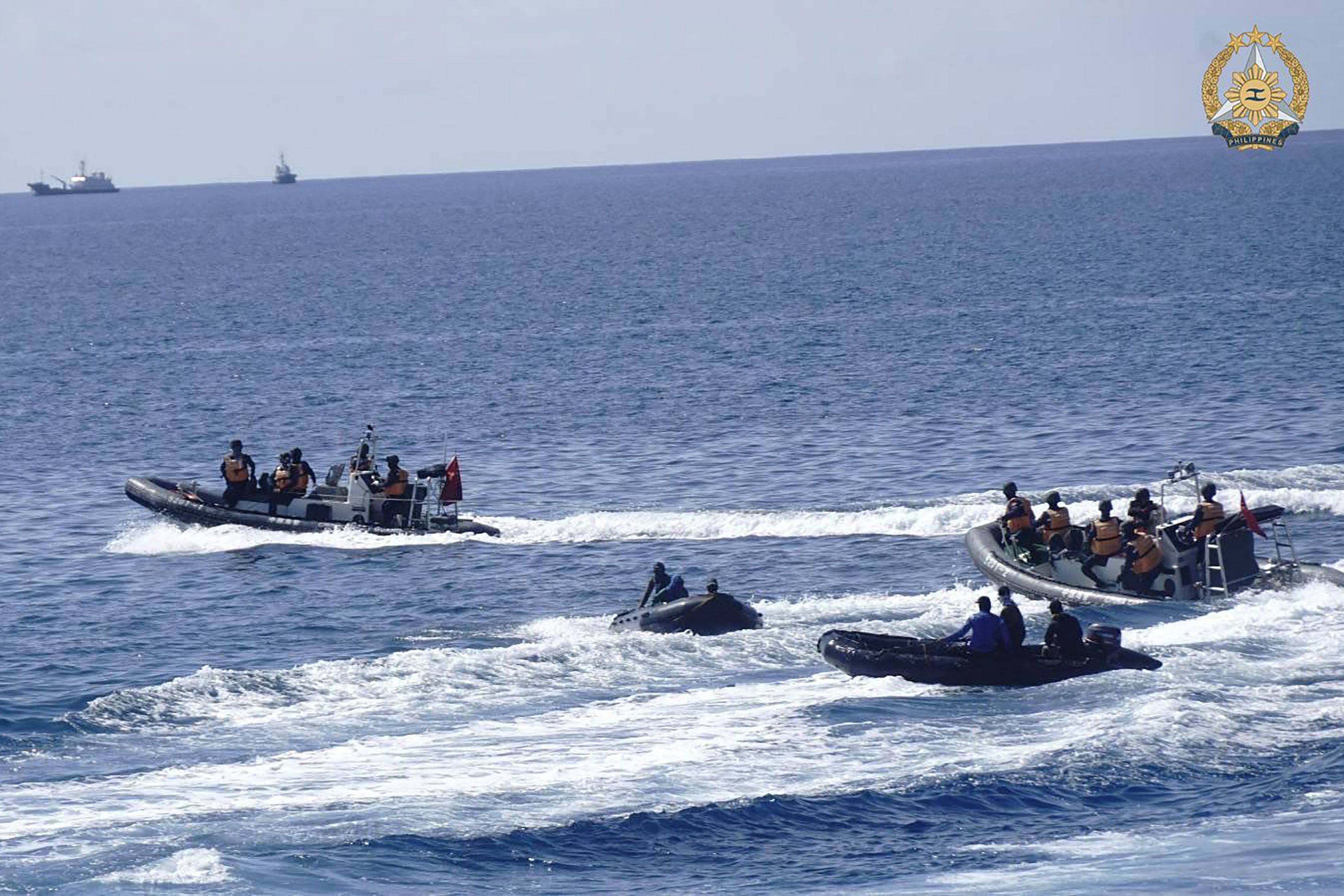 Two Chinese inflatable boats manoeuvring close to Philippine boats near the Philippine outpost at Second Thomas Shoal in disputed waters of the South China Sea on May 19. Photo: Handout