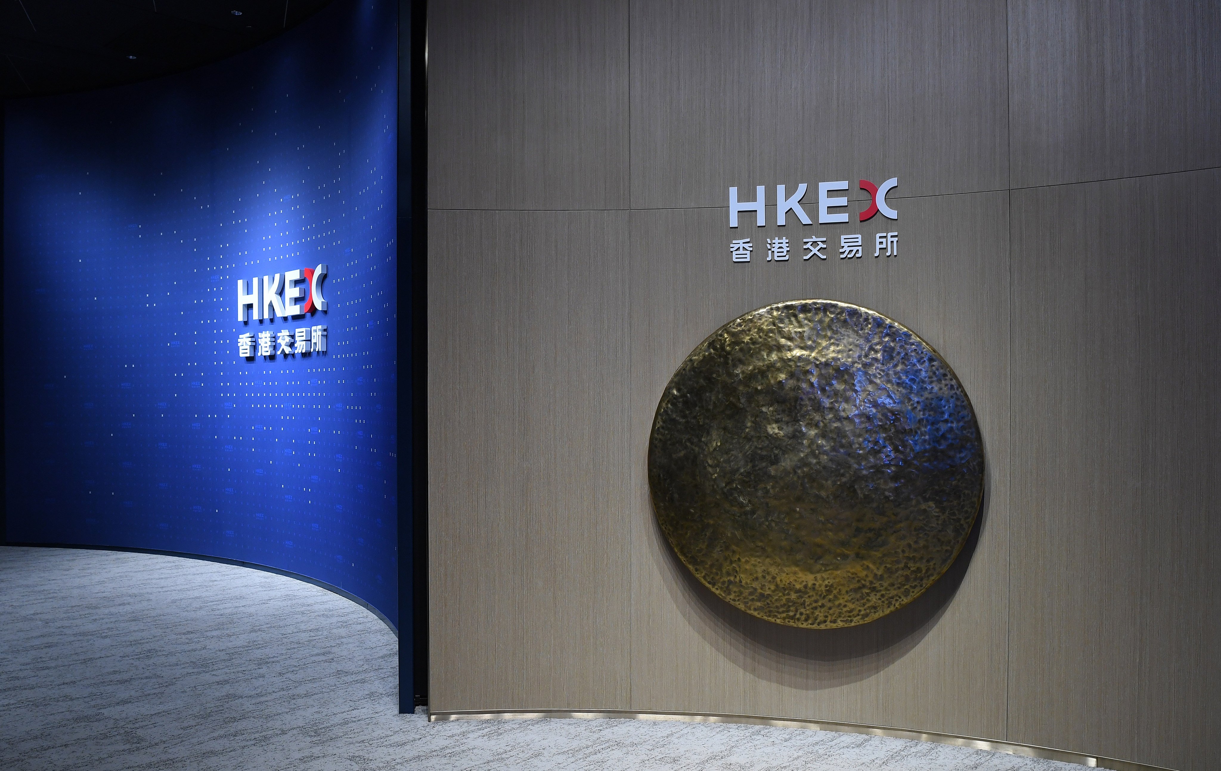 A gong used to mark new share listings is displayed inside the offices of Hong Kong Exchanges and Clearing, the city’s bourse operator. Photo: Xinhua