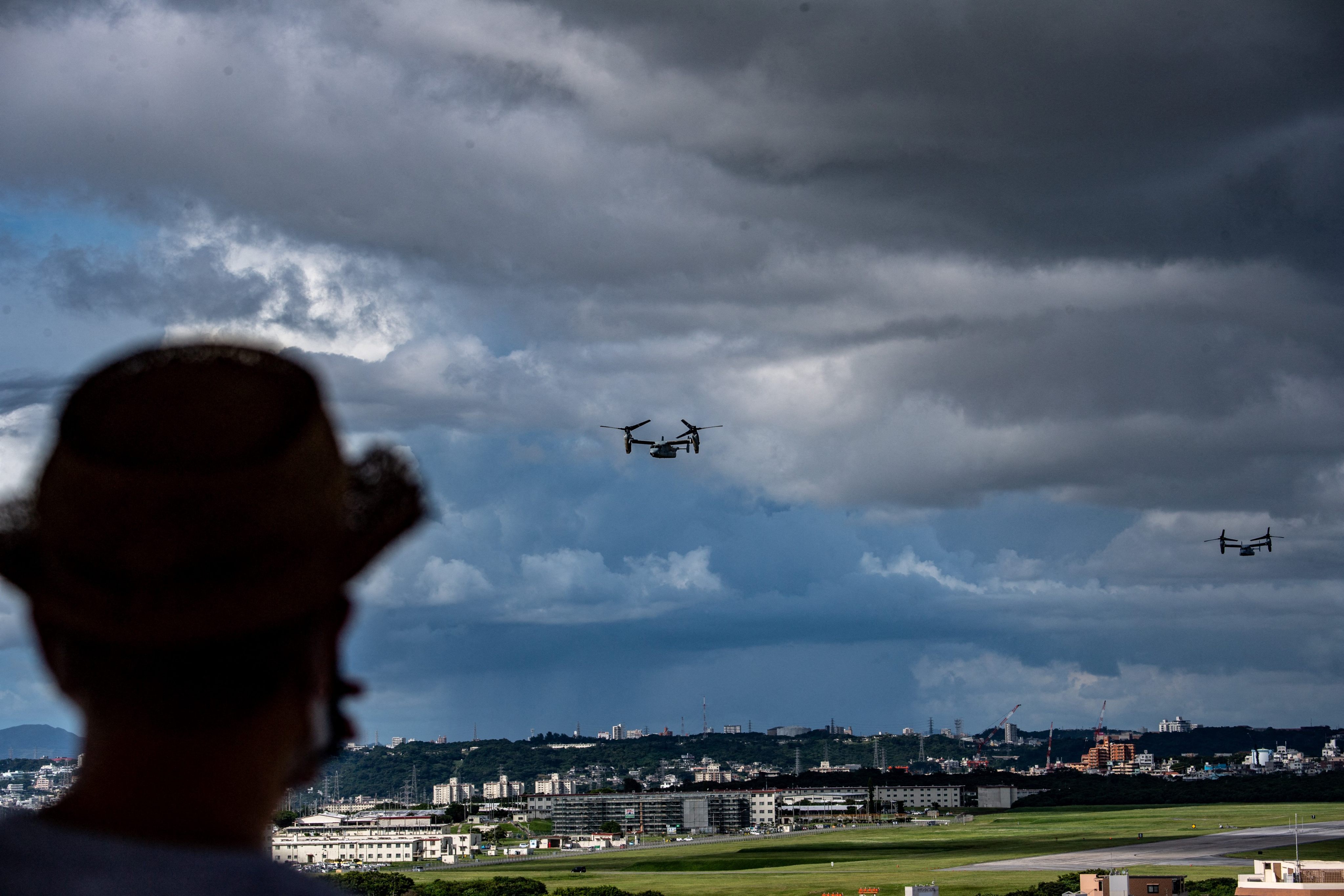 Military aircraft in flight after taking off from the US air base in Futenma. Photo: AFP