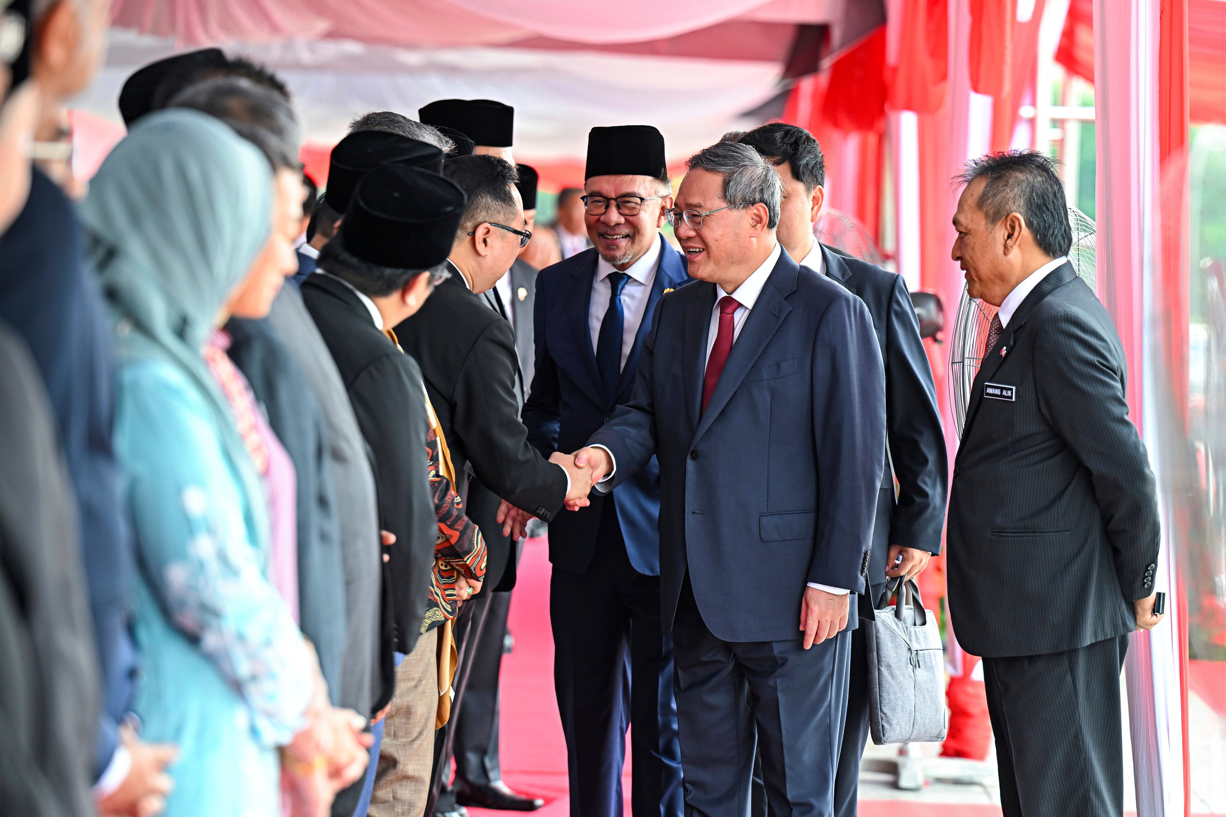 China’s Premier Li Qiang, centre, led by Malaysia Prime Minister Anwar Ibrahim, meet Malaysian cabinet members during his visit to Putrajaya, Malaysia, on Wednesday. Photo: Malaysia’s Prime Minister Office / AP