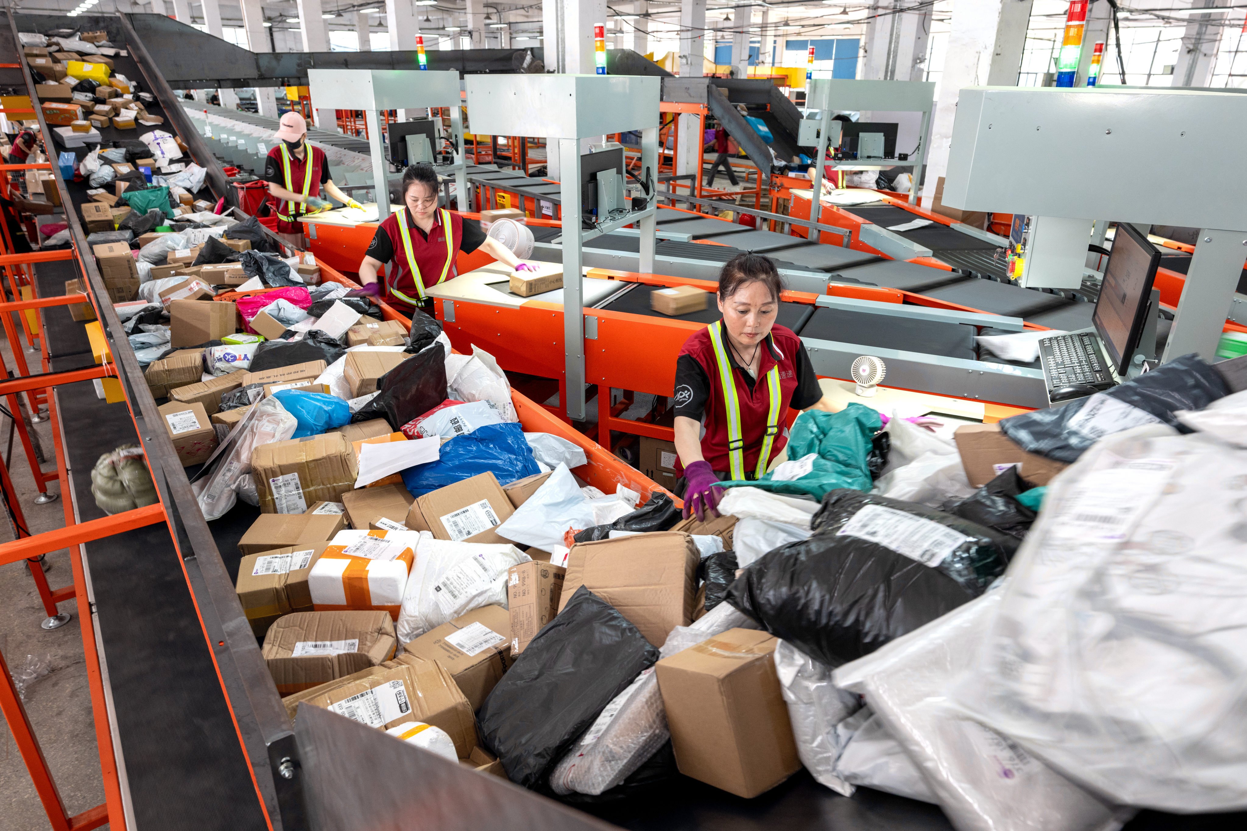 Workers sort parcels at a logistics company in Huzhou city, Zhejiang province, China, June 18, 2024, as the 618 shopping festival reached its peak. Photo: Xinhua