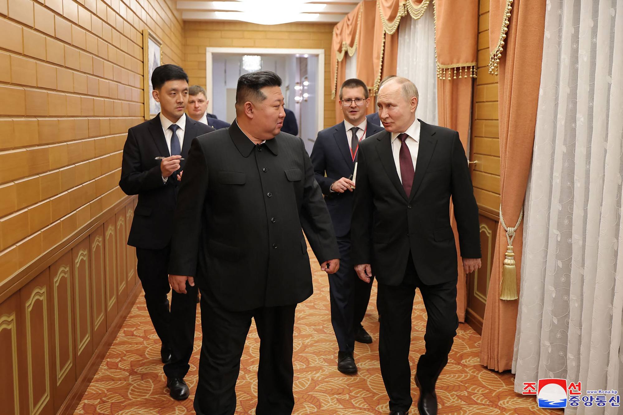 North Korea’s leader Kim Jong-un chats with Russia’s President Vladimir Putin at the Kumsusan State Guest House in Pyongyang on Wednesday. Photo: KCNA via KNS/AFP