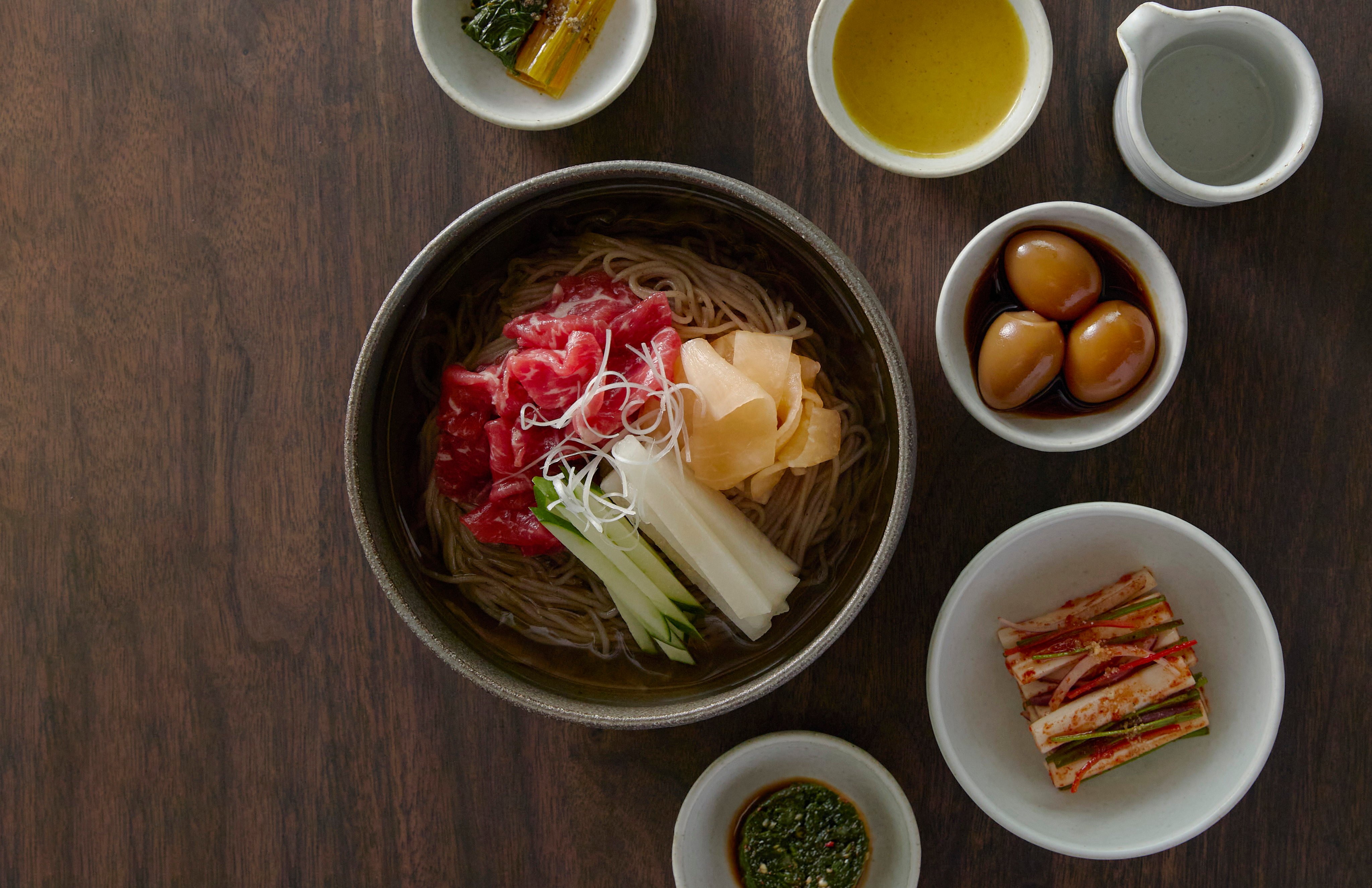 Na Oh’s Pyongyang-style cold noodles with beef and dongchimi broth, shaved raw beef loin. Photo: Na Oh