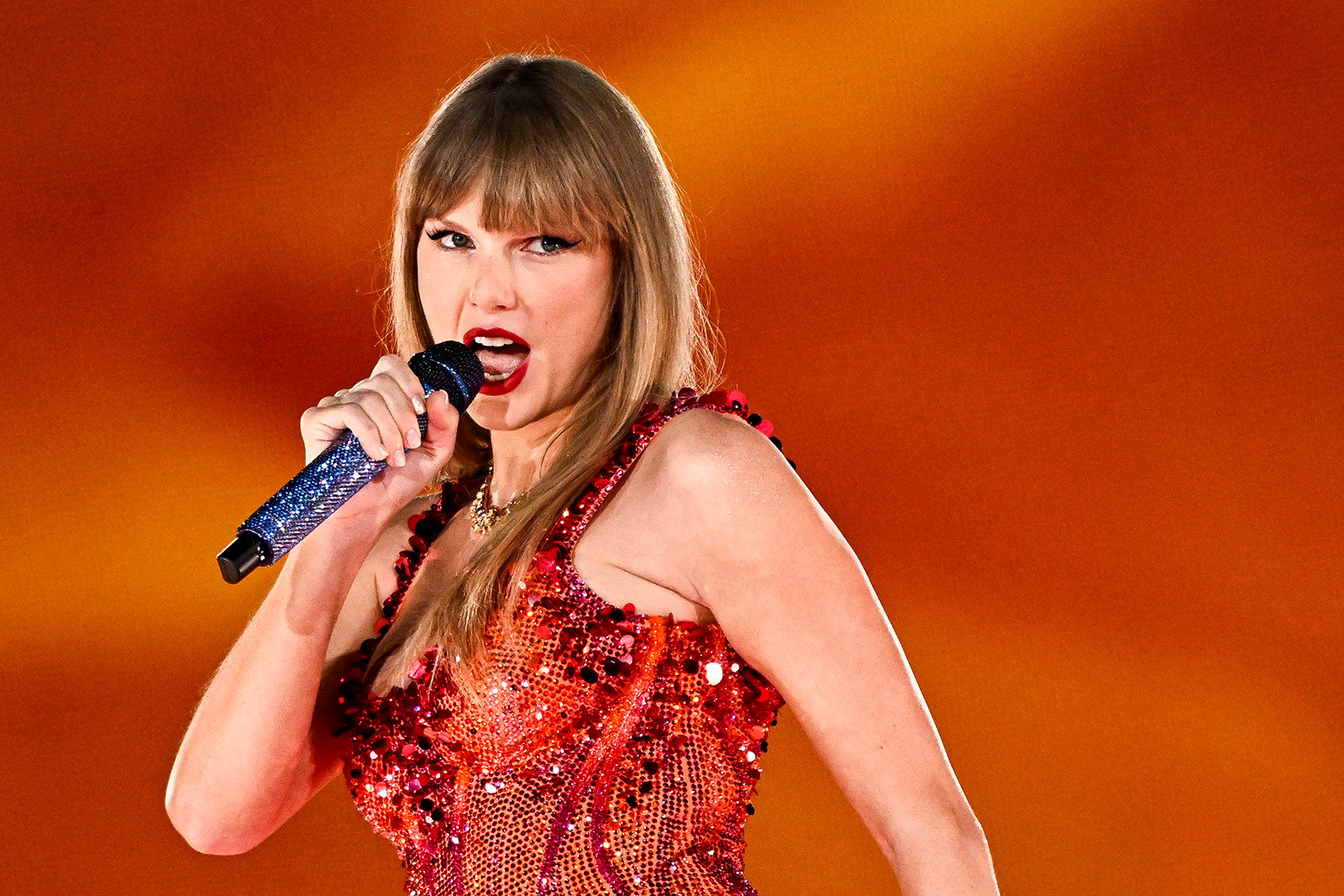 Taylor Swift performs in Paris. With tickets to her live shows in North America costing more than US$1,000 a ticket and double that on resale, some American Swifties have flown to Europe where prices are much lower, and had a holiday too. Photo: TNS