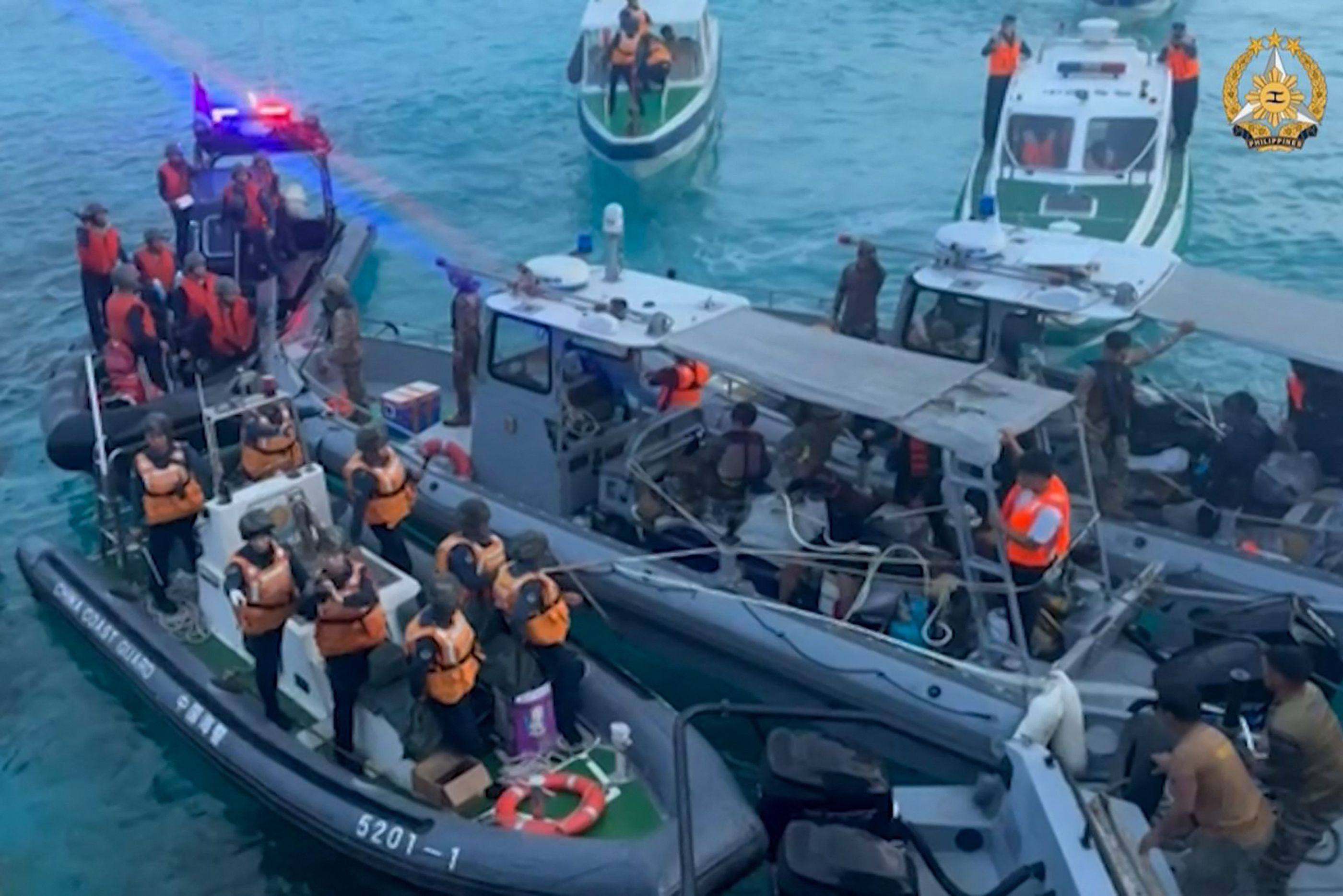 Chinese coastguard boats approach Philippine vessels near the Second Thomas Shoal in the South China Sea on Monday, according to footage release by the Philippine military. Photo: Handout/Armed Forces of the Philippines