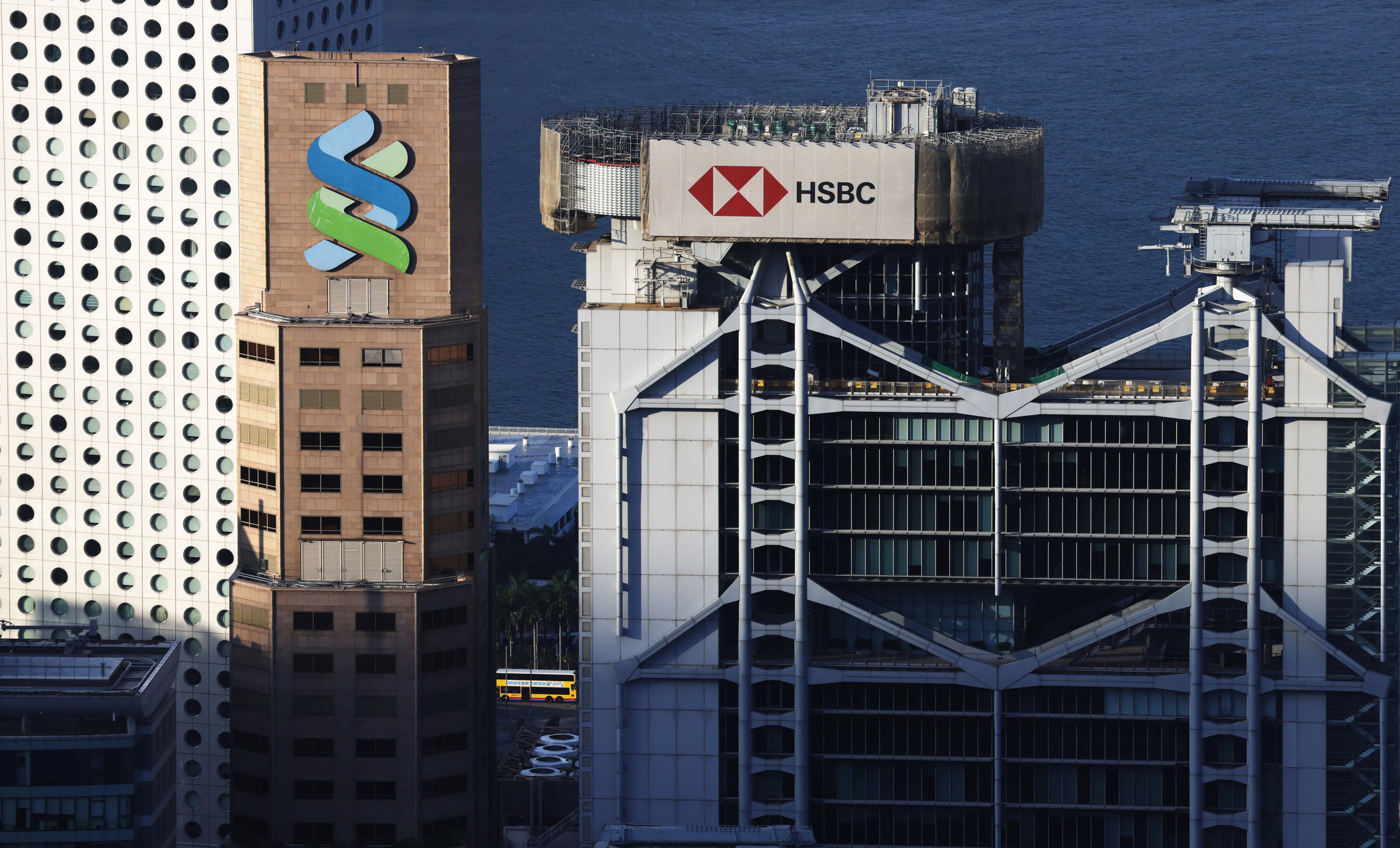 The logos of HSBC and Standard Chartered adorn their buildings in Central, Hong Kong. Photo: Nora Tam