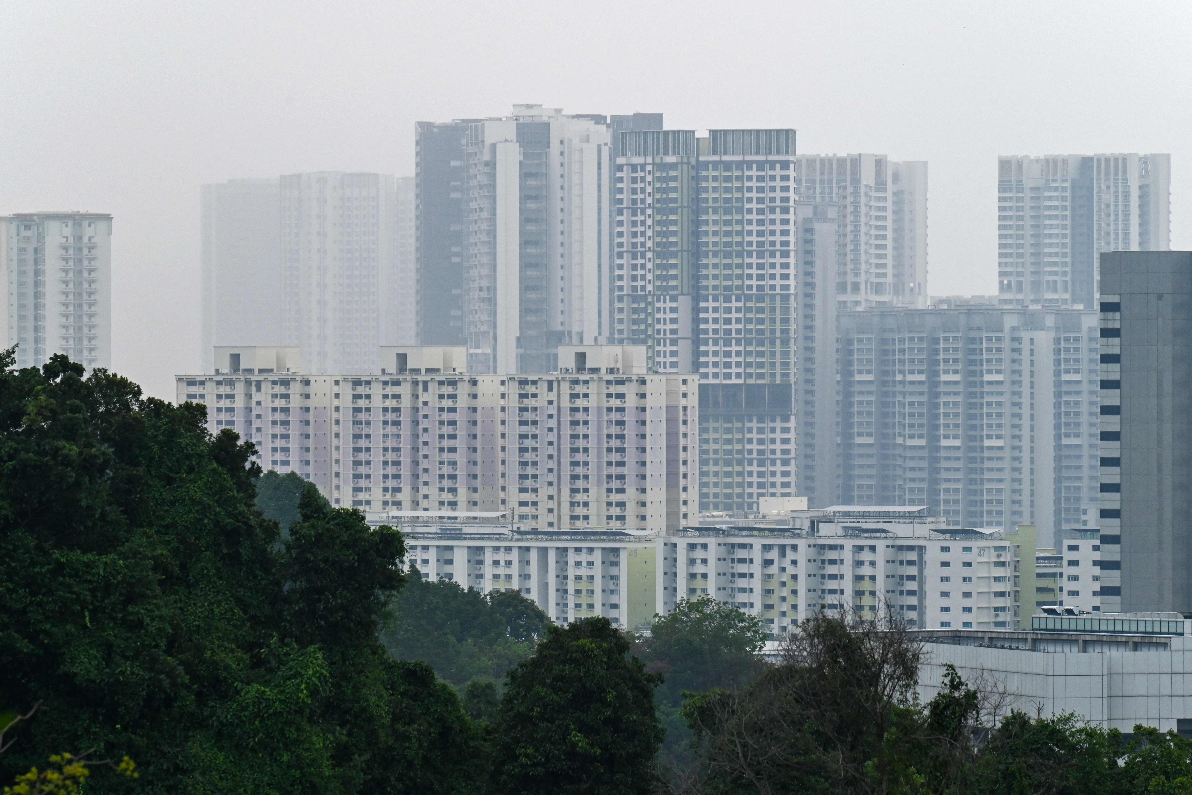 Tepid demand and economic uncertainty have prompted developers to shun bidding for residential sites in Singapore. Photo: AFP 