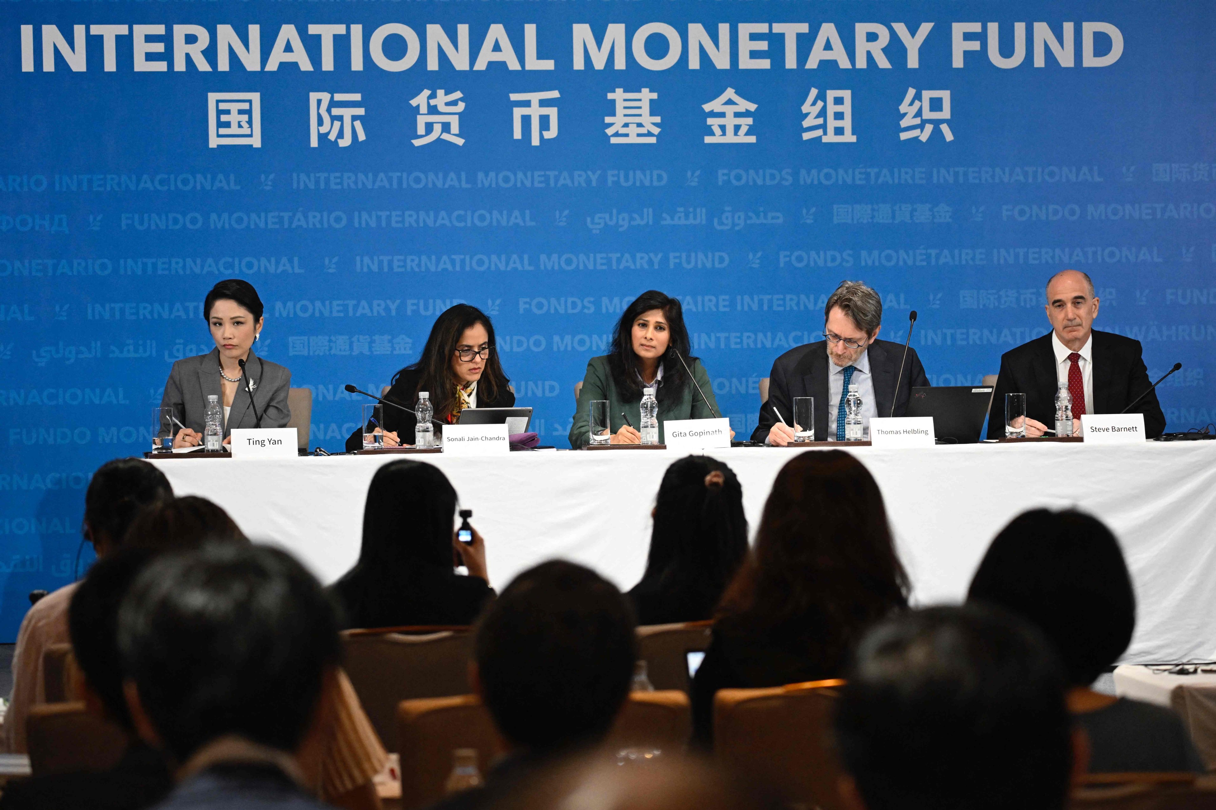 Gita Gopinath (centre), first deputy managing director of the International Monetary Fund, with her colleagues at a press briefing in Beijing on May 29. Photo: AFP