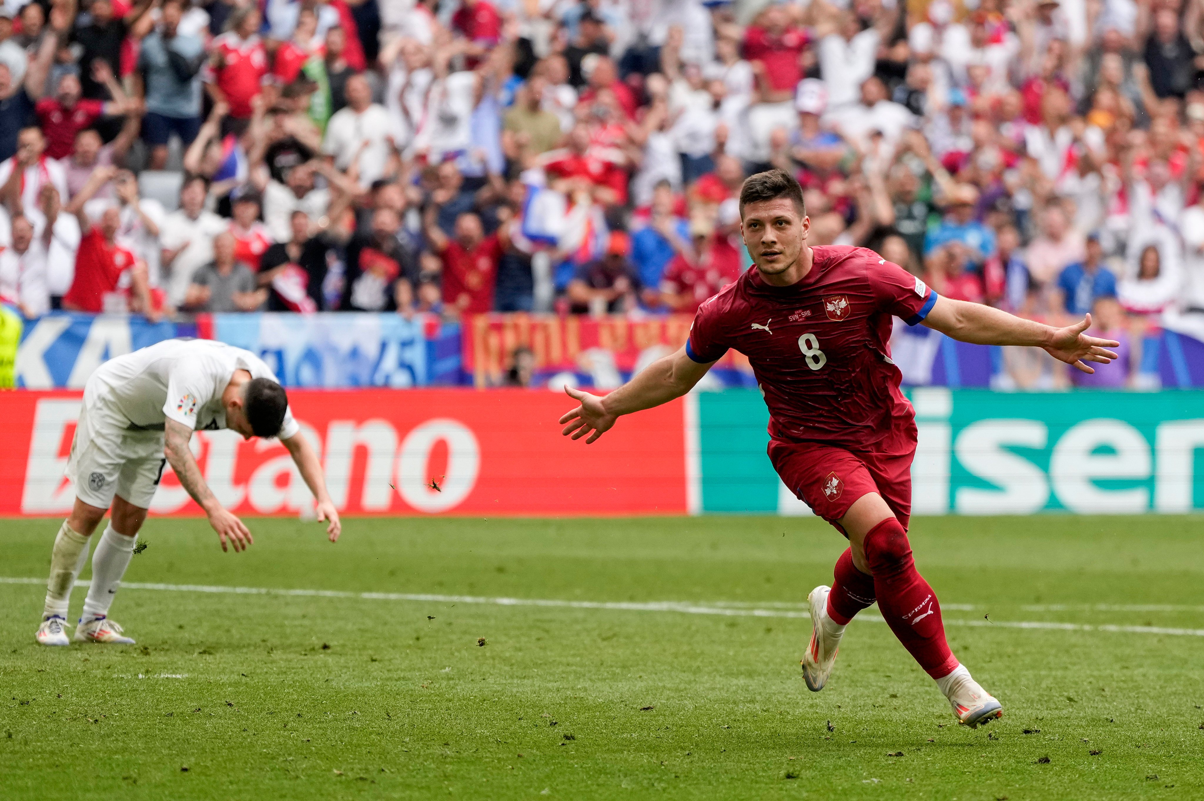 Serbia’s Luka Jovic celebrates his goal in Munich, which snatched his side a point. Photo: AP