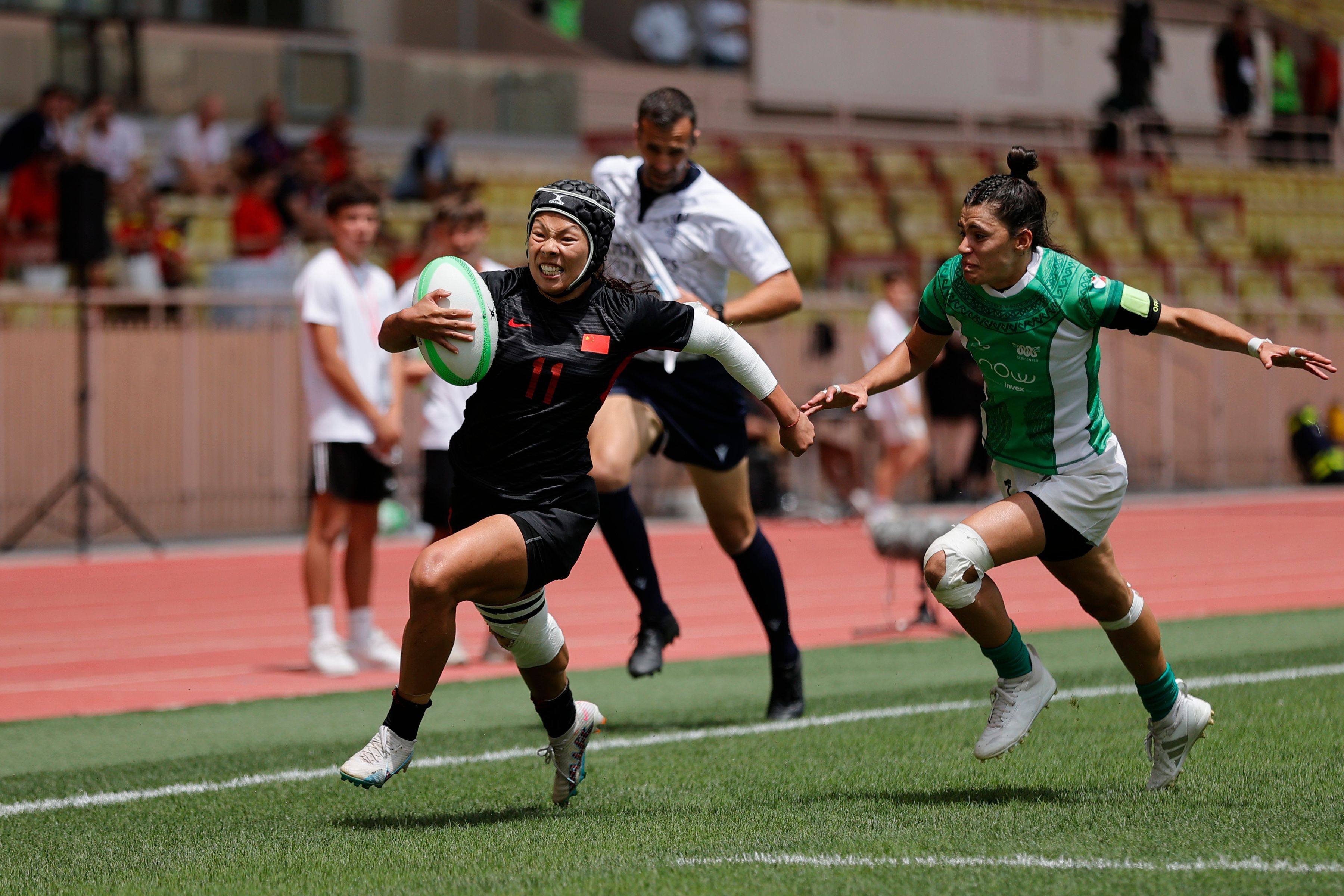 China’s Liu Xiaoqian (left) races away from the Mexico defence for a try on day one of the World Rugby Sevens Repechage at Louis II Stadium. Photo: World Rugby