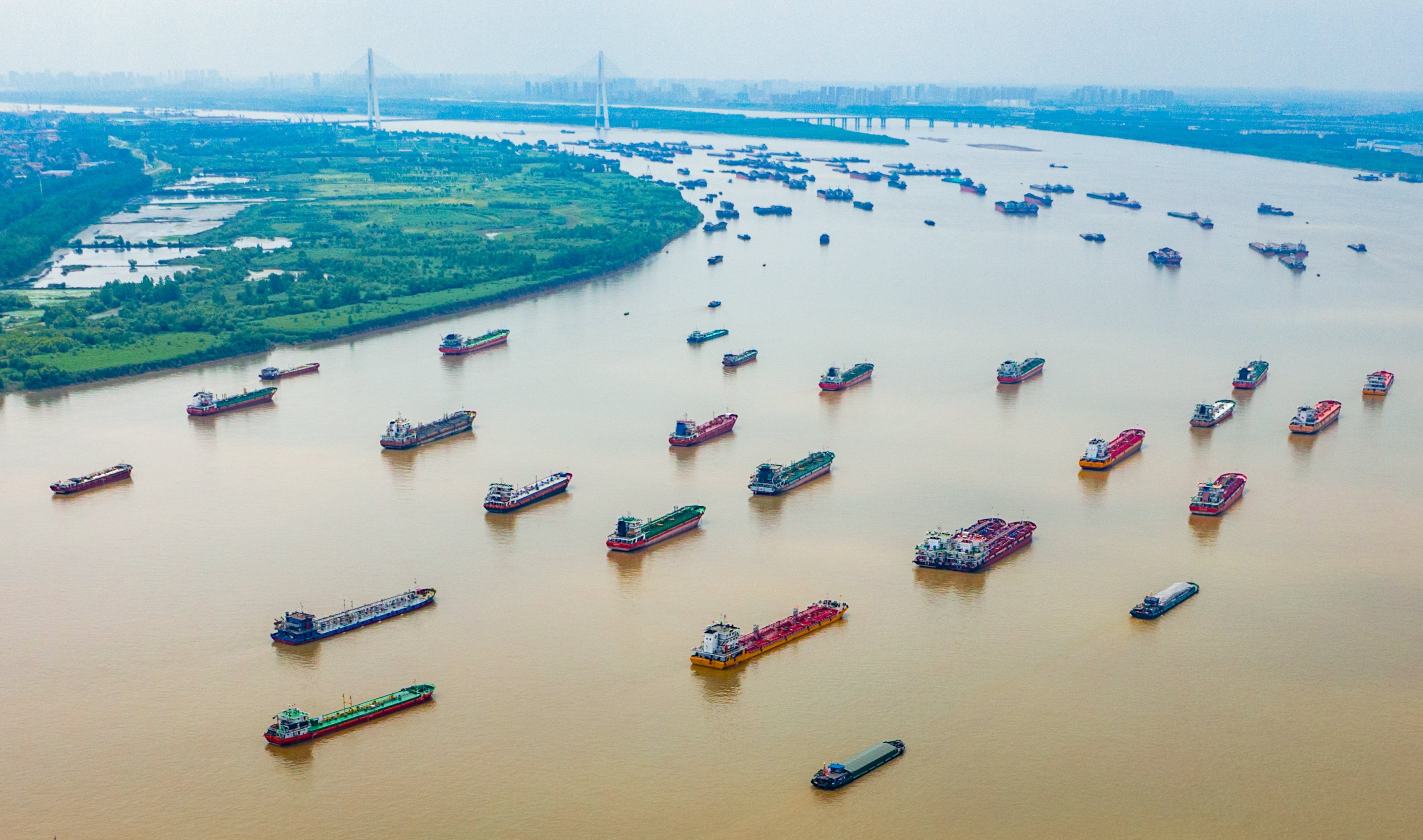 An aerial view of the Yangtze River near Yangluo Port in Wuhan in central China’s Hubei province is seen on June 1. Experts say the sagging efficiency of the waterway must improve to boost the region’s economy. Photo: Xinhua