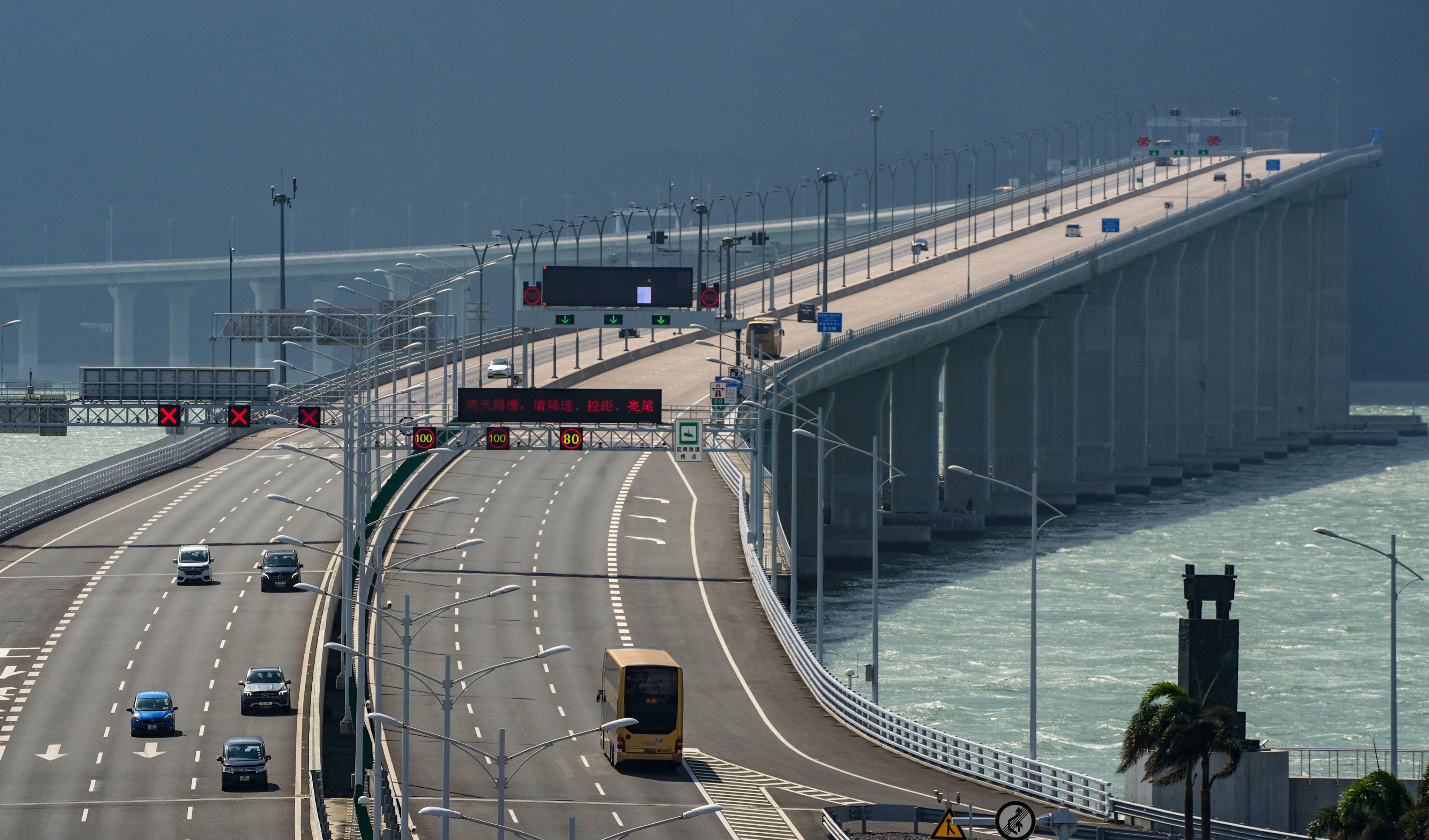 A scheme opened for applications last year to allow residents to drive into Guangdong province via the Hong Kong-Zhuhai-Macau Bridge. Photo: Eugene Lee