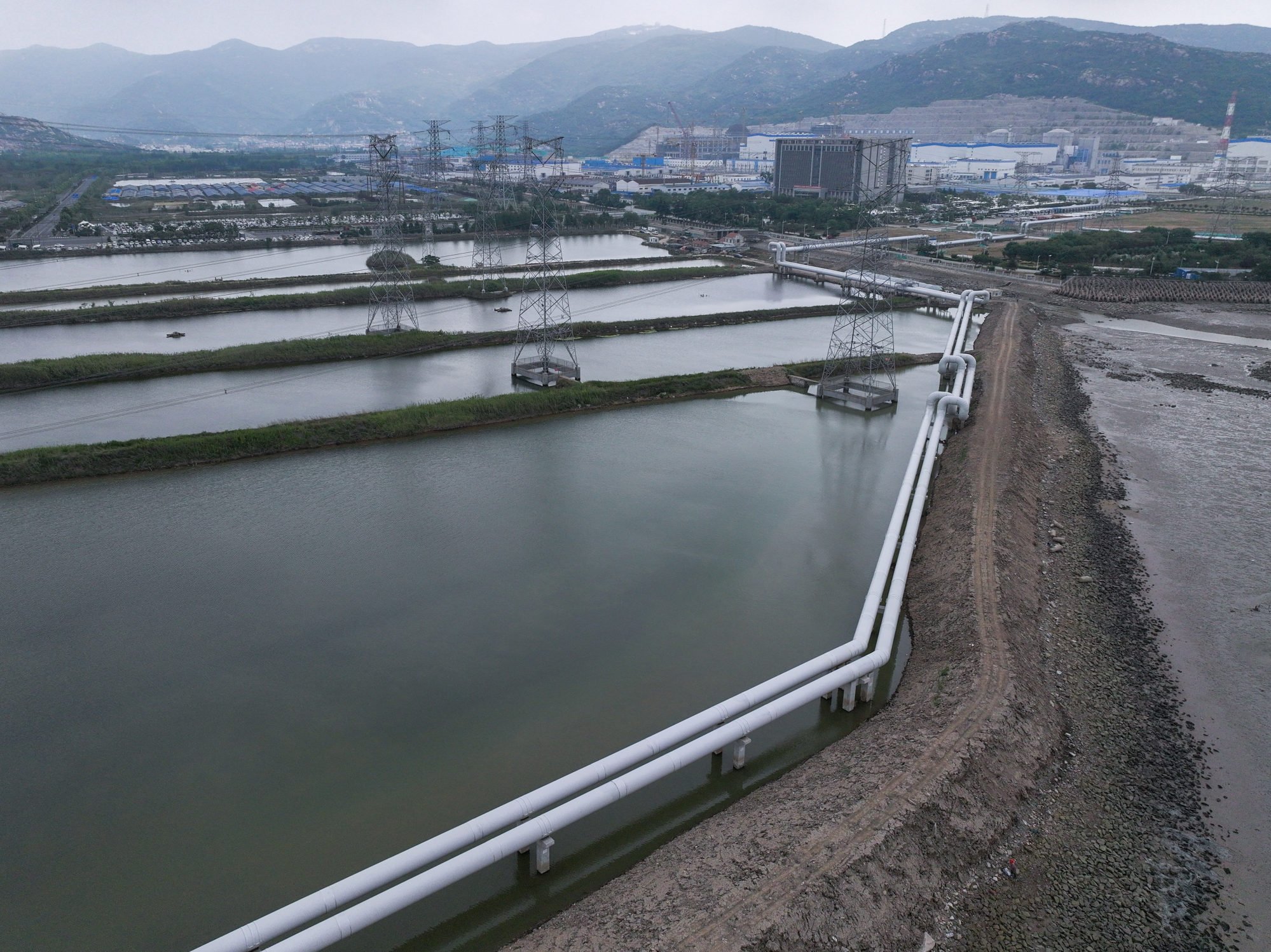 Heqi No 1’s pipelines in Lianyungang, which transport steam generated at the Tianwan nuclear power station to a petrochemical base. Photo: Xinhua