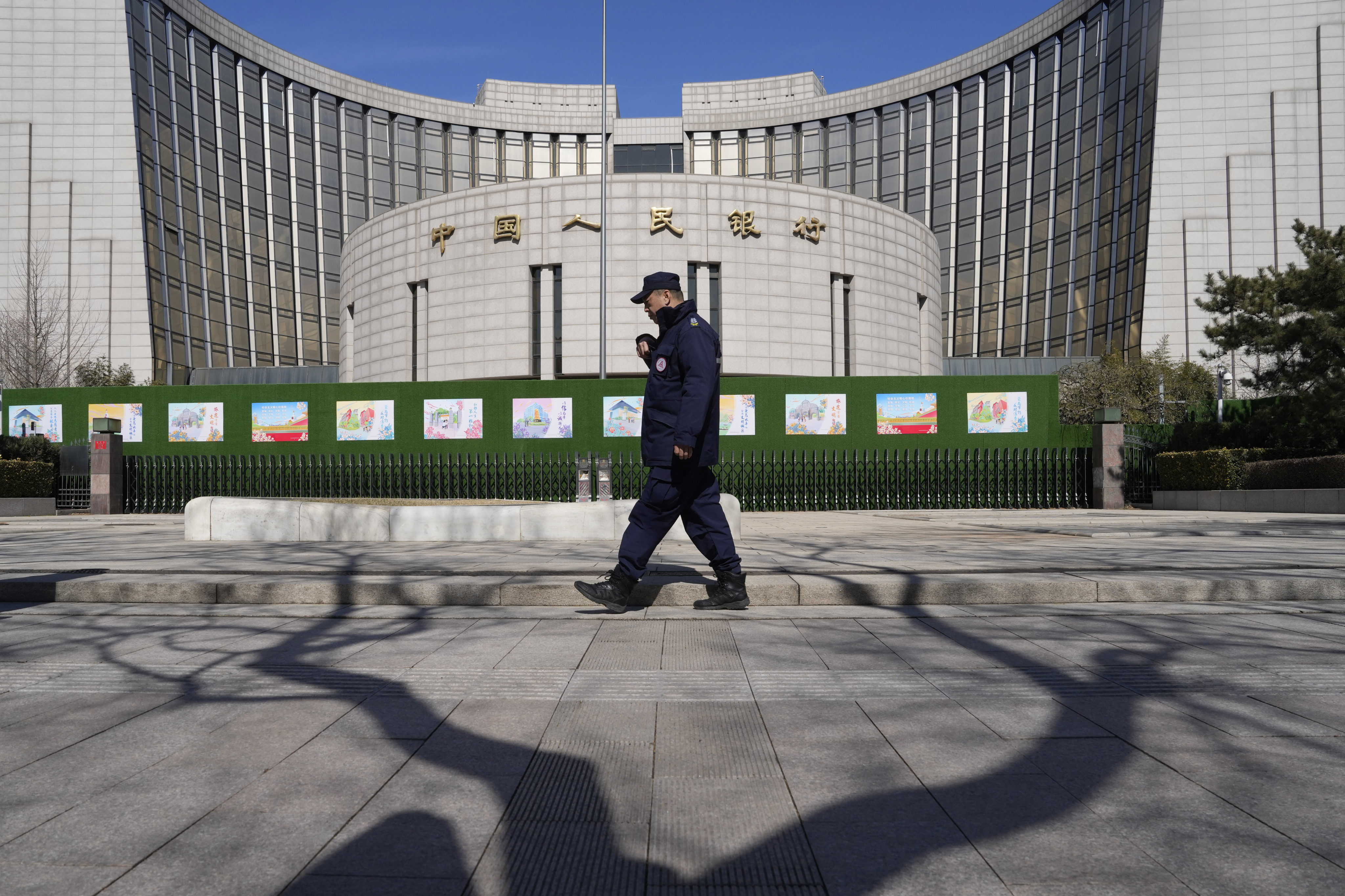 The People’s Bank of China and the Ministry of Finance have held discussions for treasury bond purchases in the secondary markets. Photo: AP