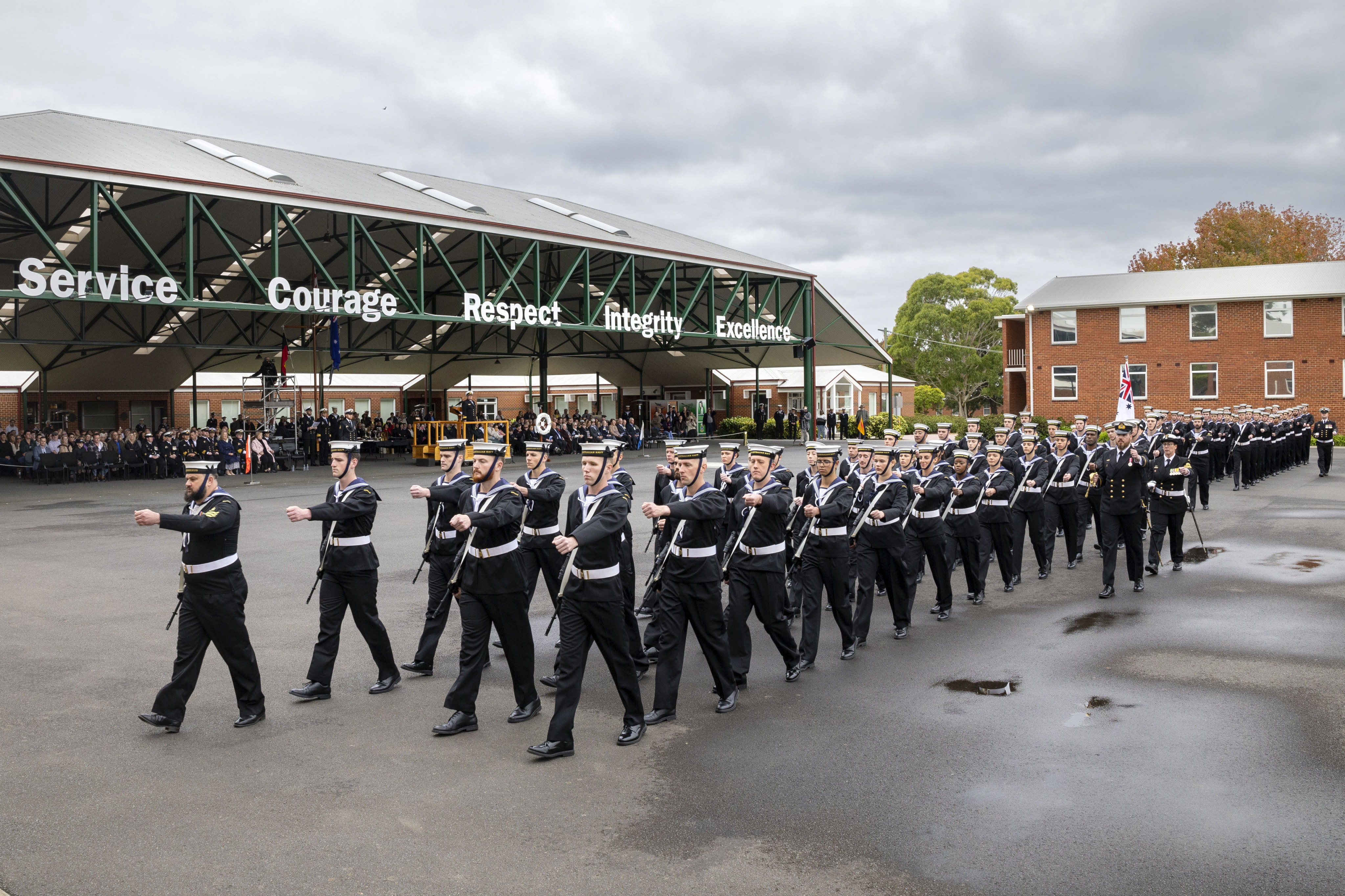 Australian navy recruits march on to the parade ground during their graduation ceremony in Melbourne. Photo: AP