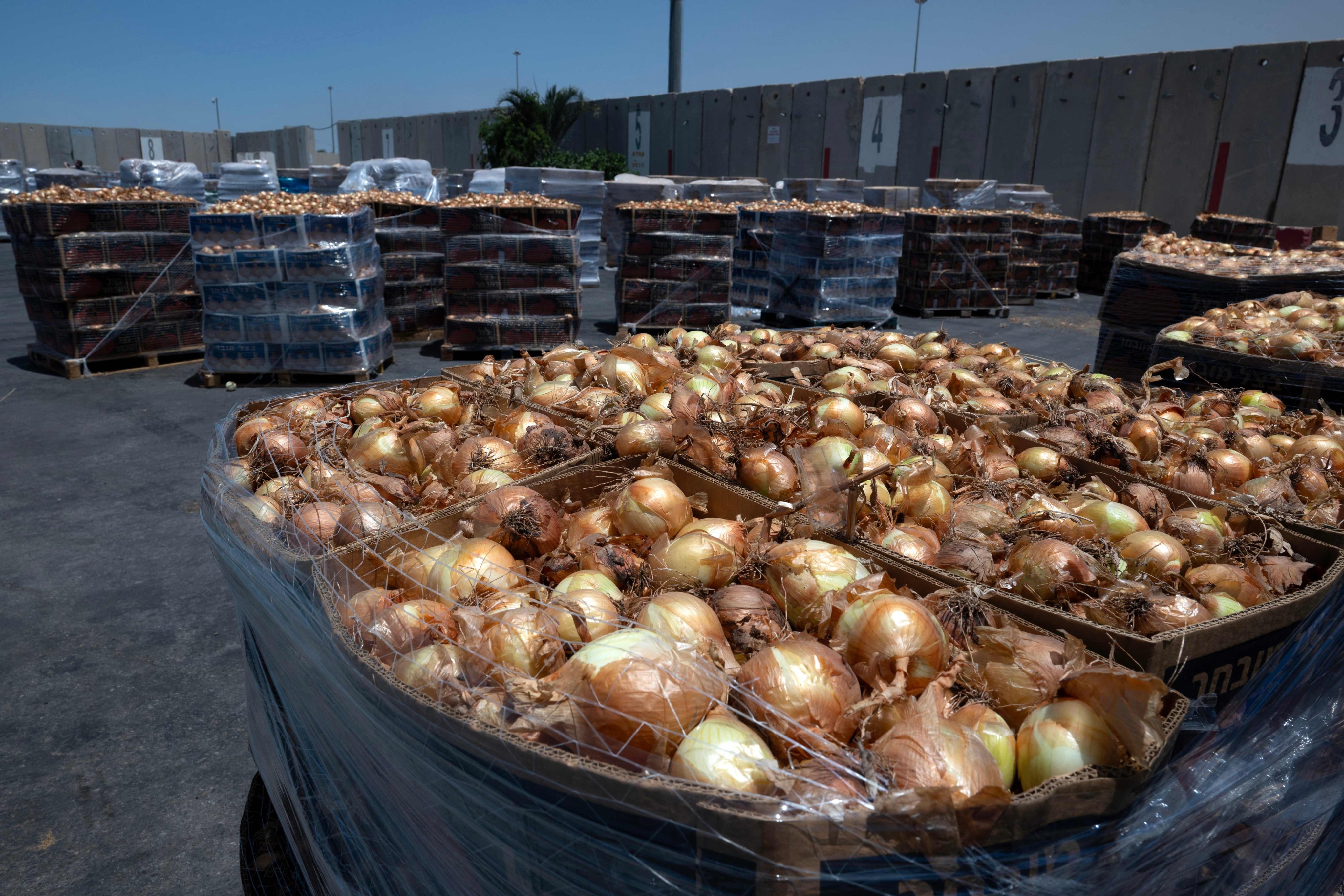 Humanitarian aid for the Gaza Strip waits to be load into trucks at the Kerem Shalom border crossing between southern Israel and Gaza, on June 17. Photo: AFP