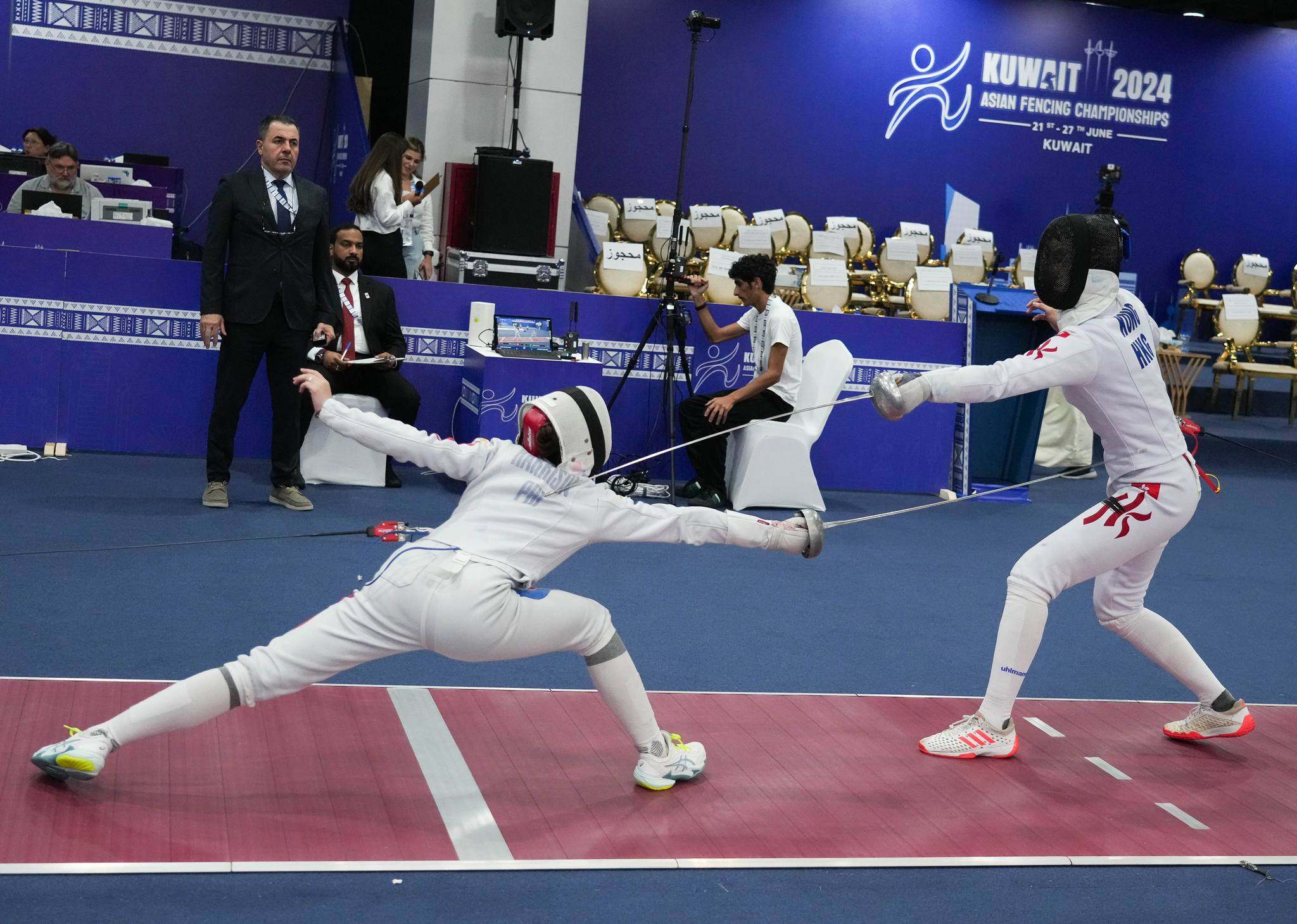 Vivian Kong of Hong Kong (right) in action in Kuwait. Photo: FIE