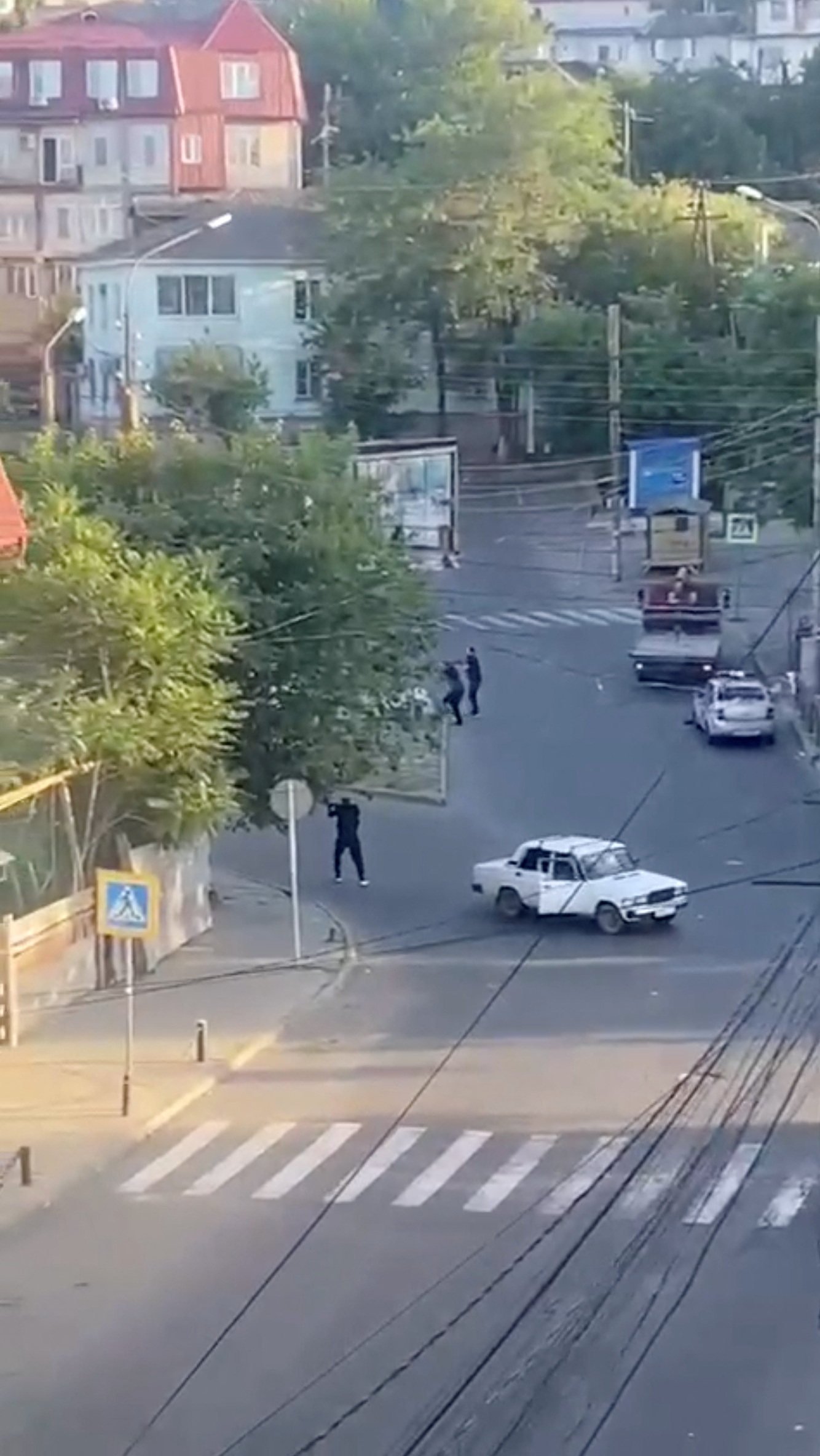 A shooting scene on a street in Makhachkala in Dagestan, southern Russia. Photo: from video obtained by Reuters