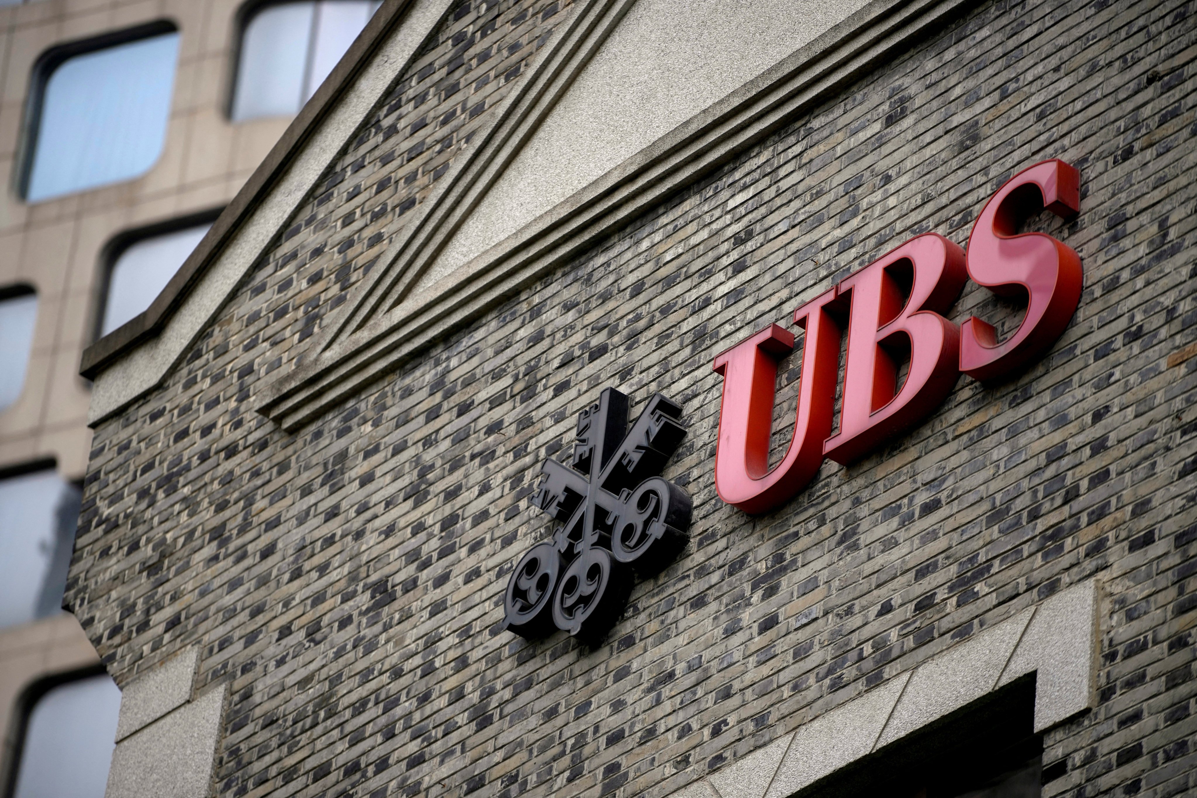 The logo of Swiss bank UBS is seen at the bank’s branch in Shanghai. Photo: Reuters