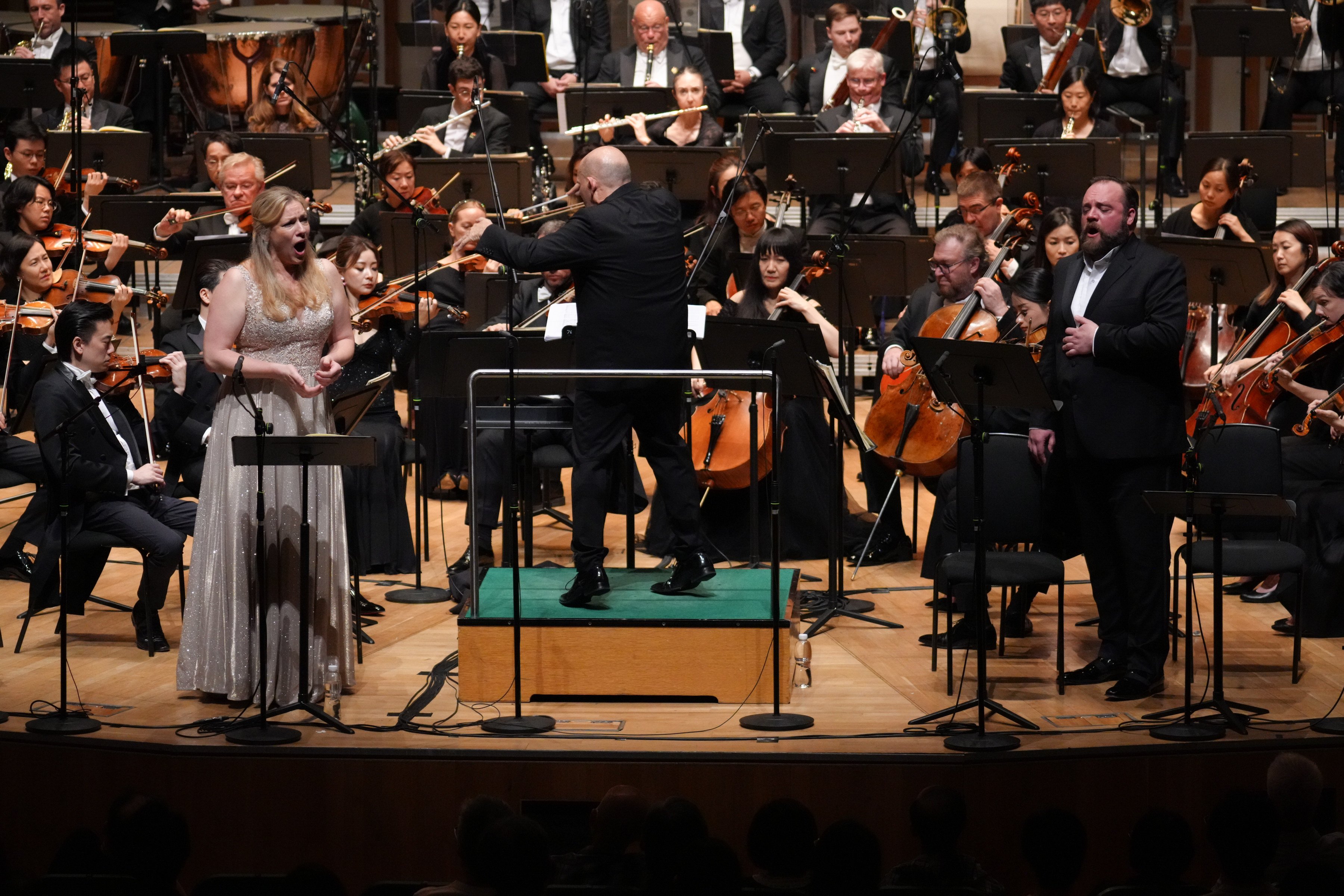 Soprano Jennifer Holloway (left) and bass-baritone Brian Mulligan (right) with the Hong Kong Philharmonic Orchestra under music director Jaap van Zweden during the June 21, 2024 performance of Richard Wagner’s opera The Flying Dutchman. Photo: Desmond Chan/HK Phil