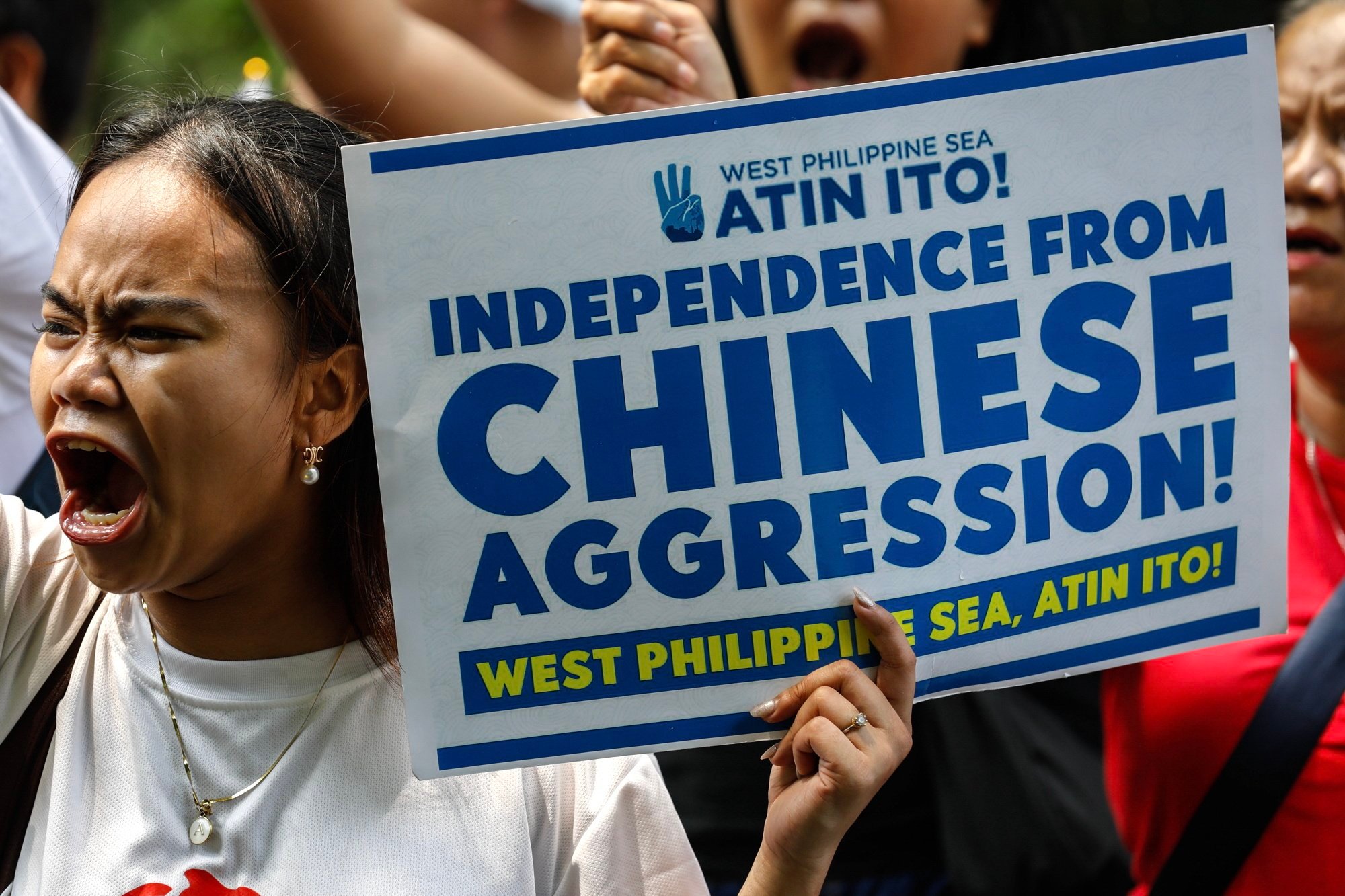 A protester chants anti-China slogans during a protest in Metro Manila on June 11. Photo: EPA-EFE