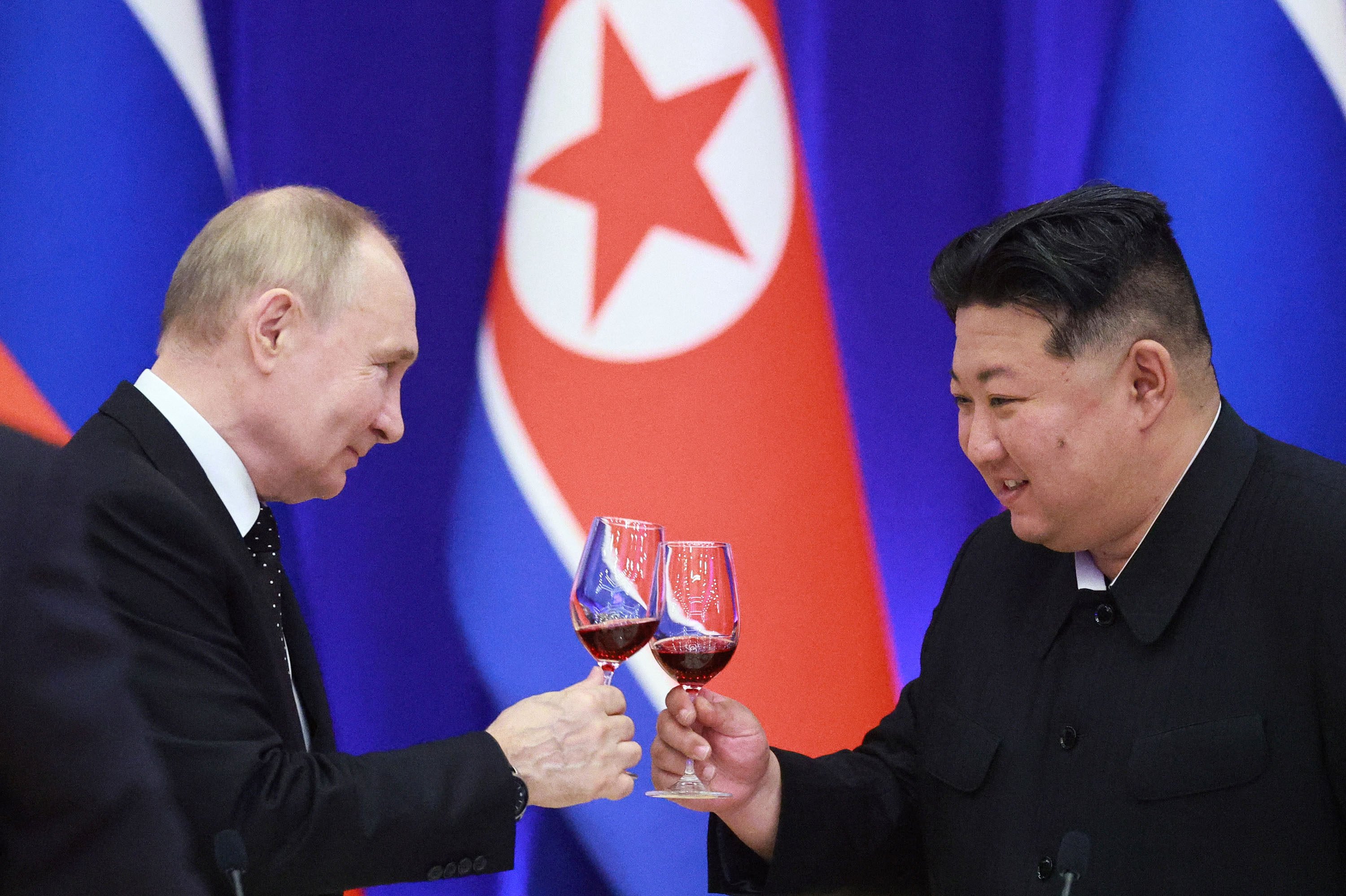 Russian President Vladimir Putin and North Korean leader Kim Jong-un during a reception in Pyongyang on June 19. Photo: Sputnik/AFP/TNS