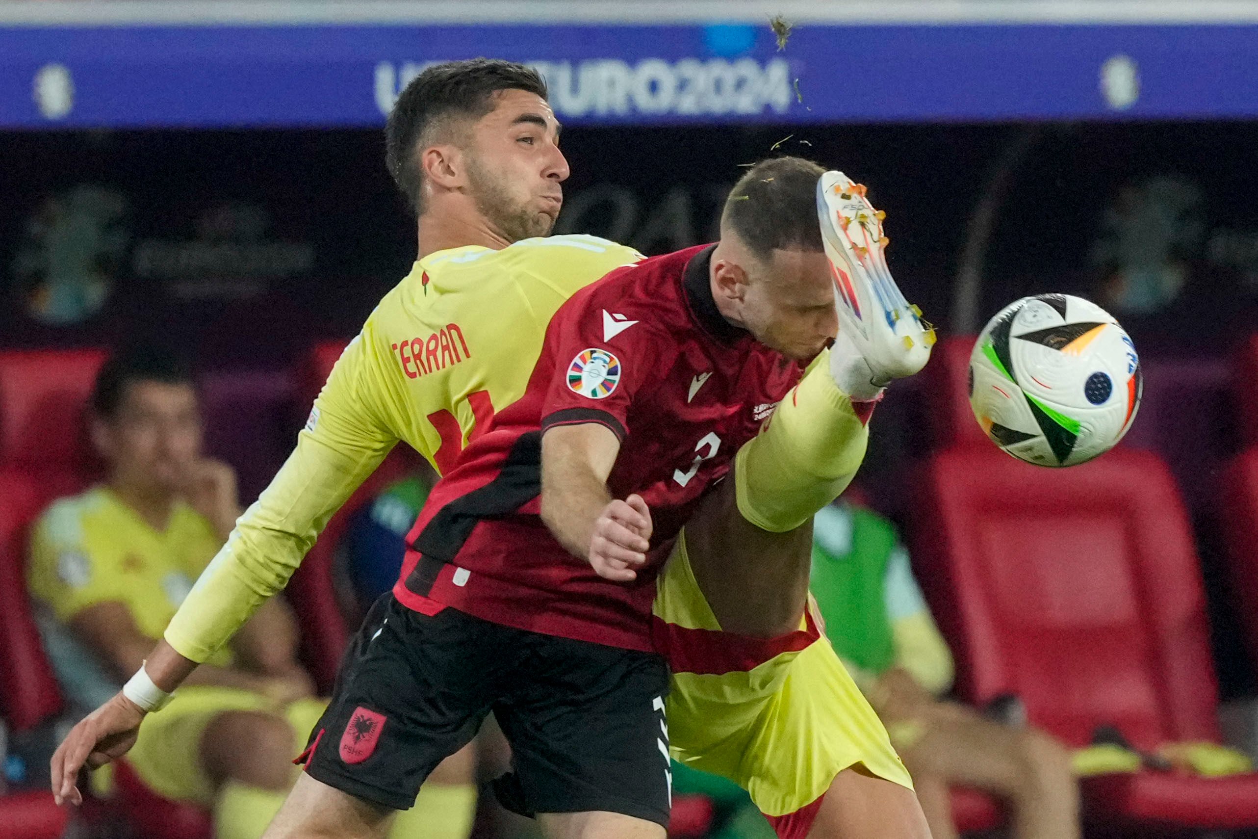 Albania’s Mario Mitaj (front) vies for the ball with Spain’s Ferran Torres during their teams’ Euro 2024 clash. Photo: AP