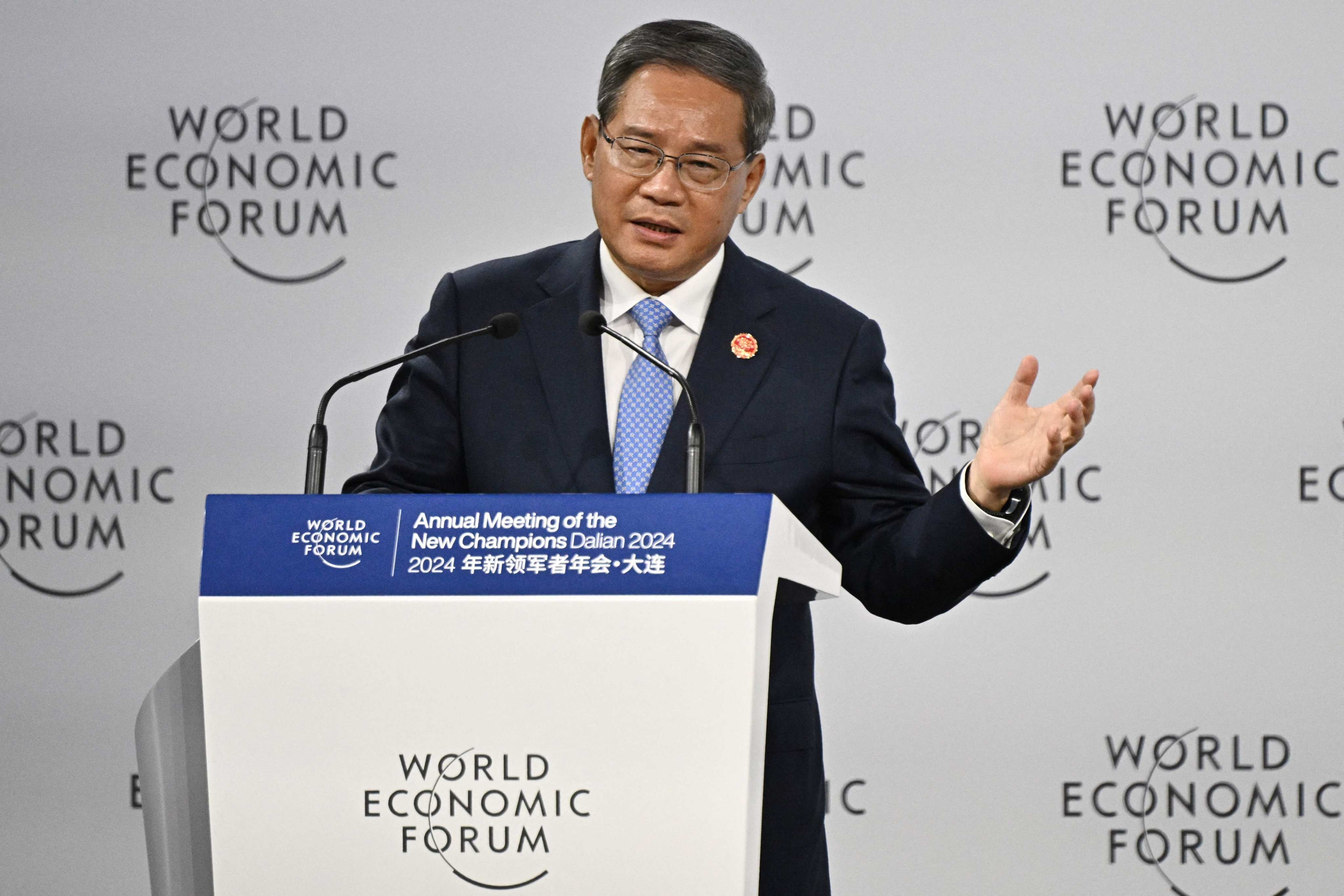 Chinese Premier Li Qiang delivers his speech during the opening ceremony of the World Economic Forum . Photo: AFP
