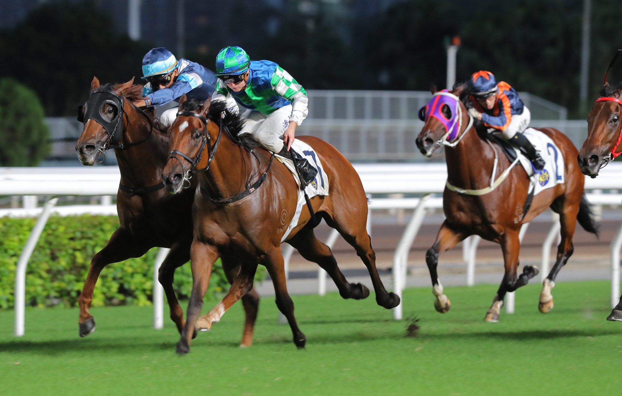 Copartner Prance (centre) holds off Duke Wai (inside) for a fifth straight win.