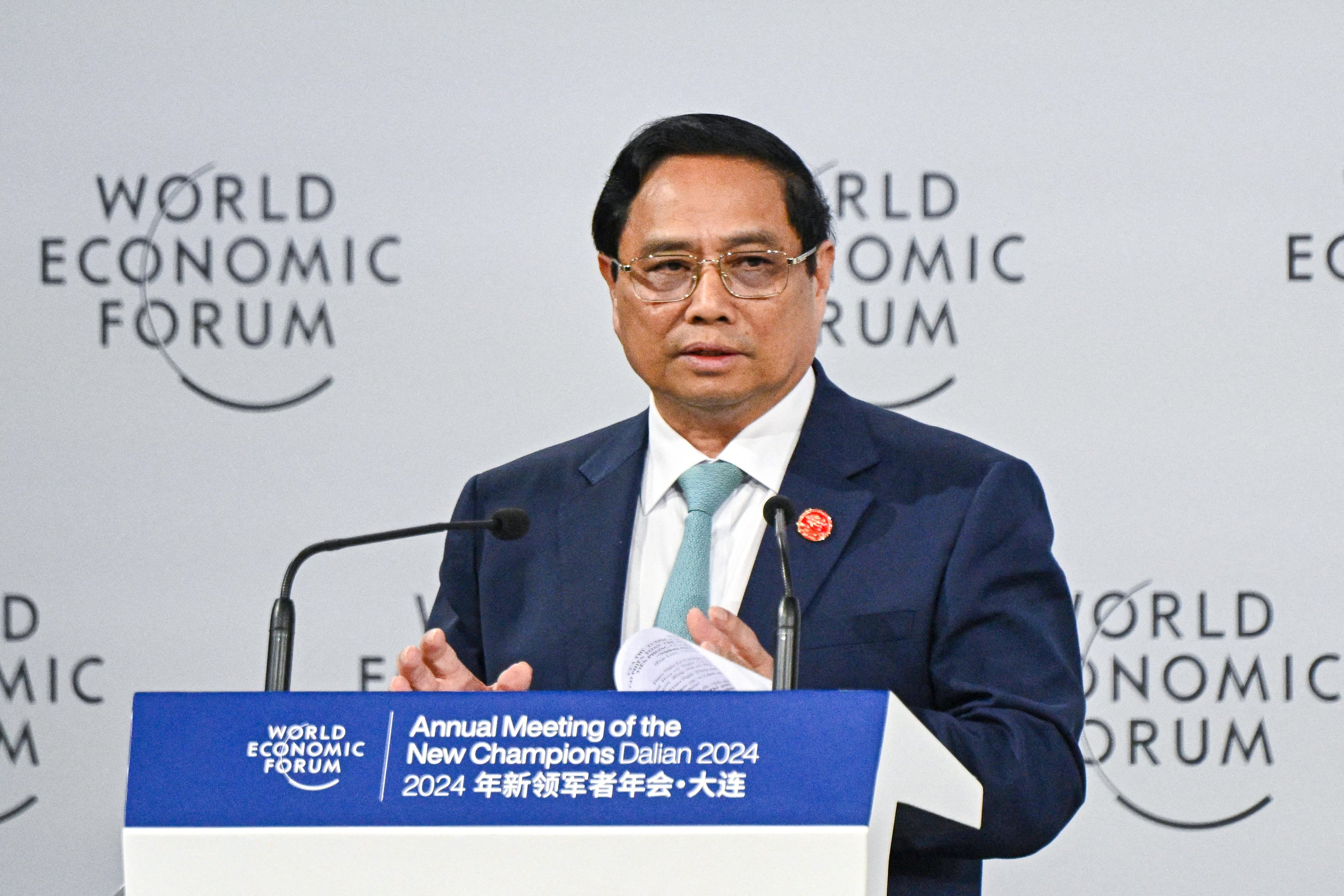 Vietnamese Prime Minister Pham Minh Chinh addresses the 15th WEF Annual Meeting of the New Champions in Dalian, in China’s northeastern Liaoning province, on Tuesday. Photo: AFP