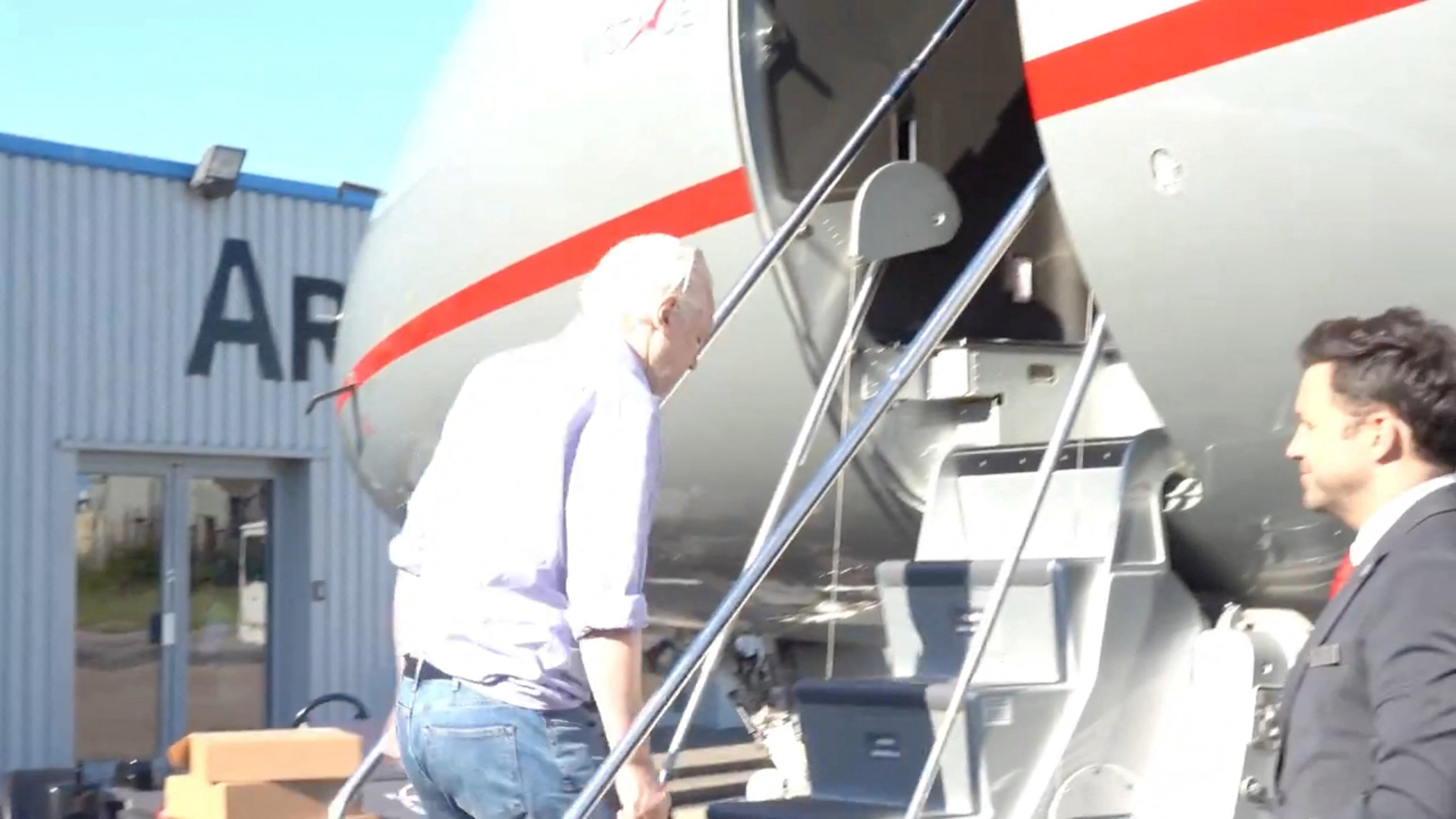 Julian Assange boarding a private jet on Monday. Photo: @wikileaks via X 