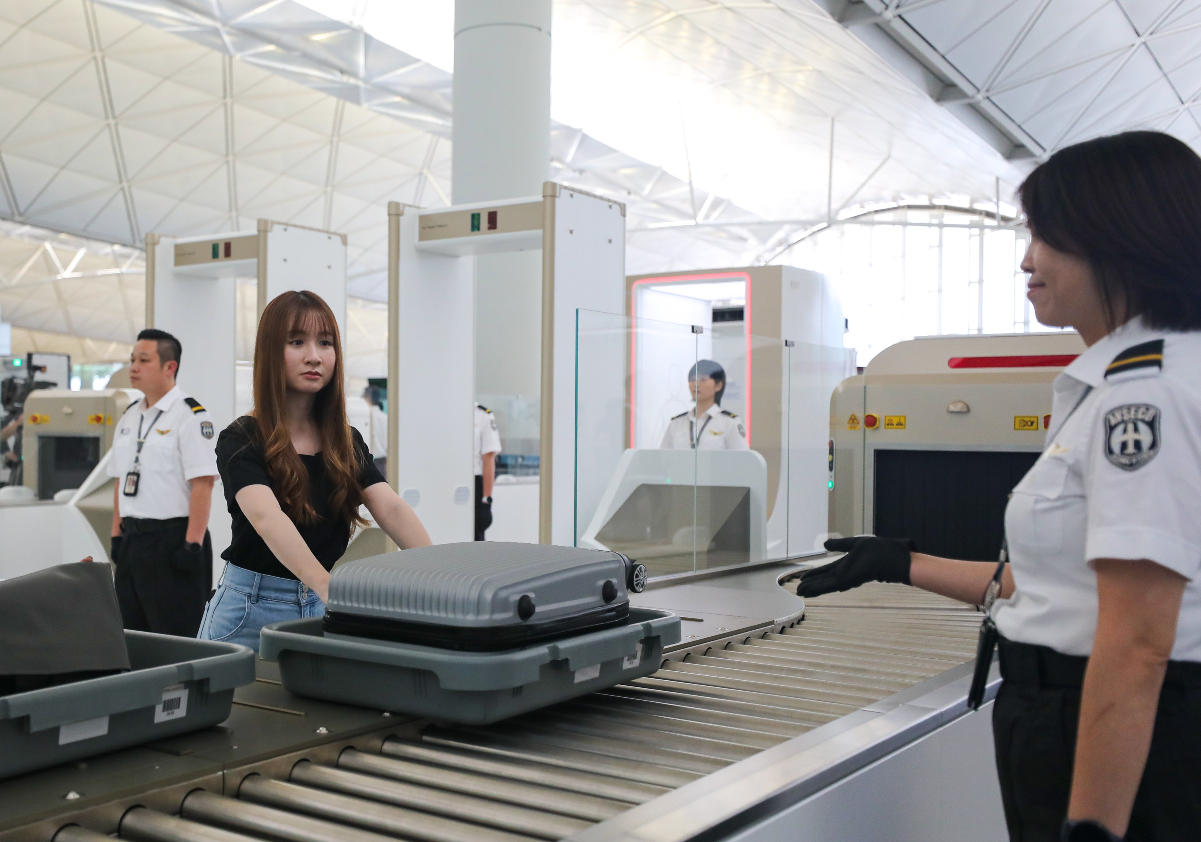 Airport officials say they expect the new screening channels to each process 360 people every hour, compared with 240 under the old system. Photo: Xiaomei Chen