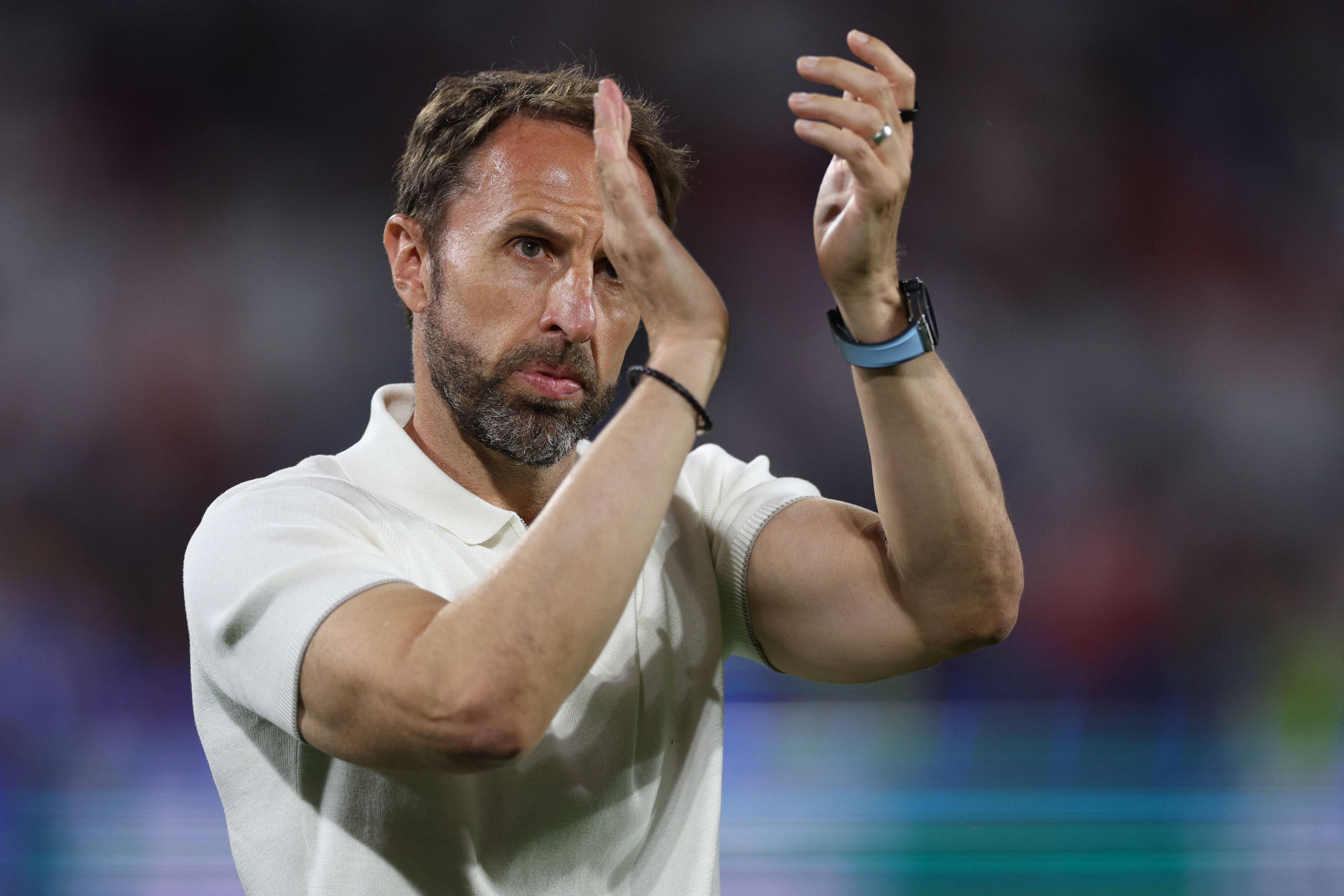 England’s head coach Gareth Southgate gestures to fans after his side’s draw with Slovenia. Photo: AFP