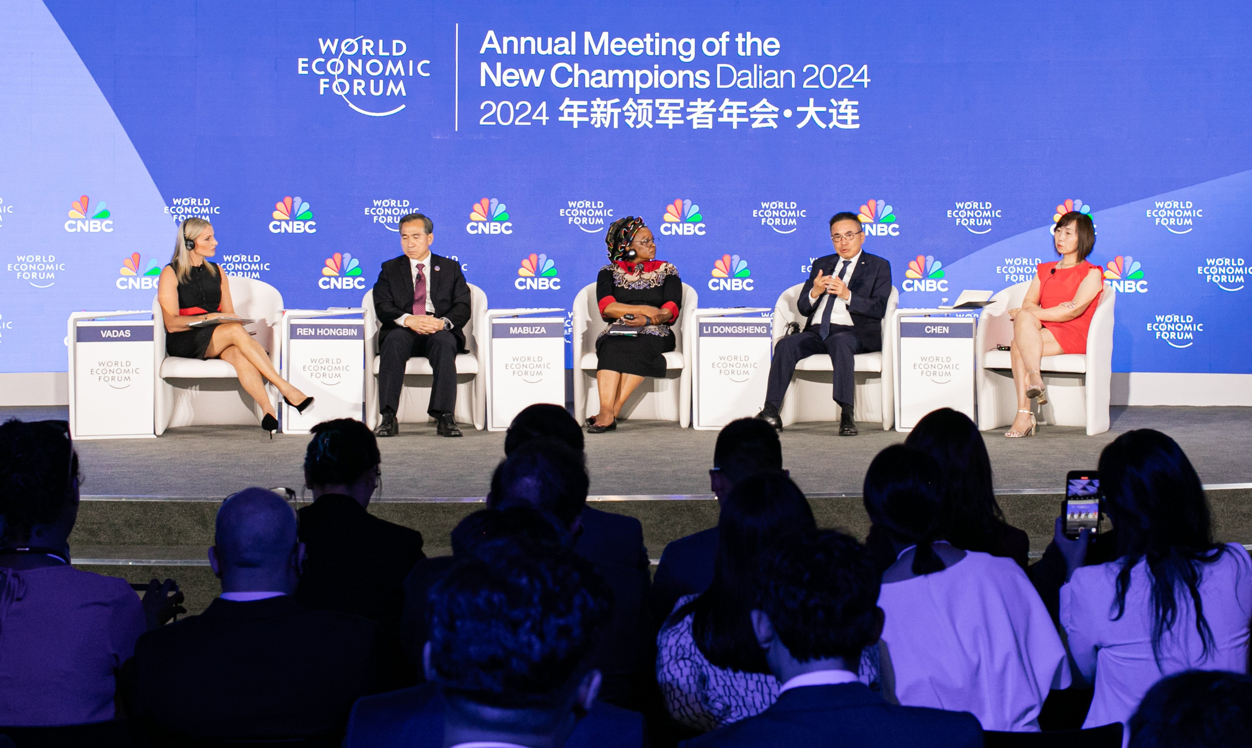 Li Dongsheng (second right) and Ren Hongbin (second left) during a session at the Annual Meeting of the New Champions in Dalian. Photo: World Economic Forum
